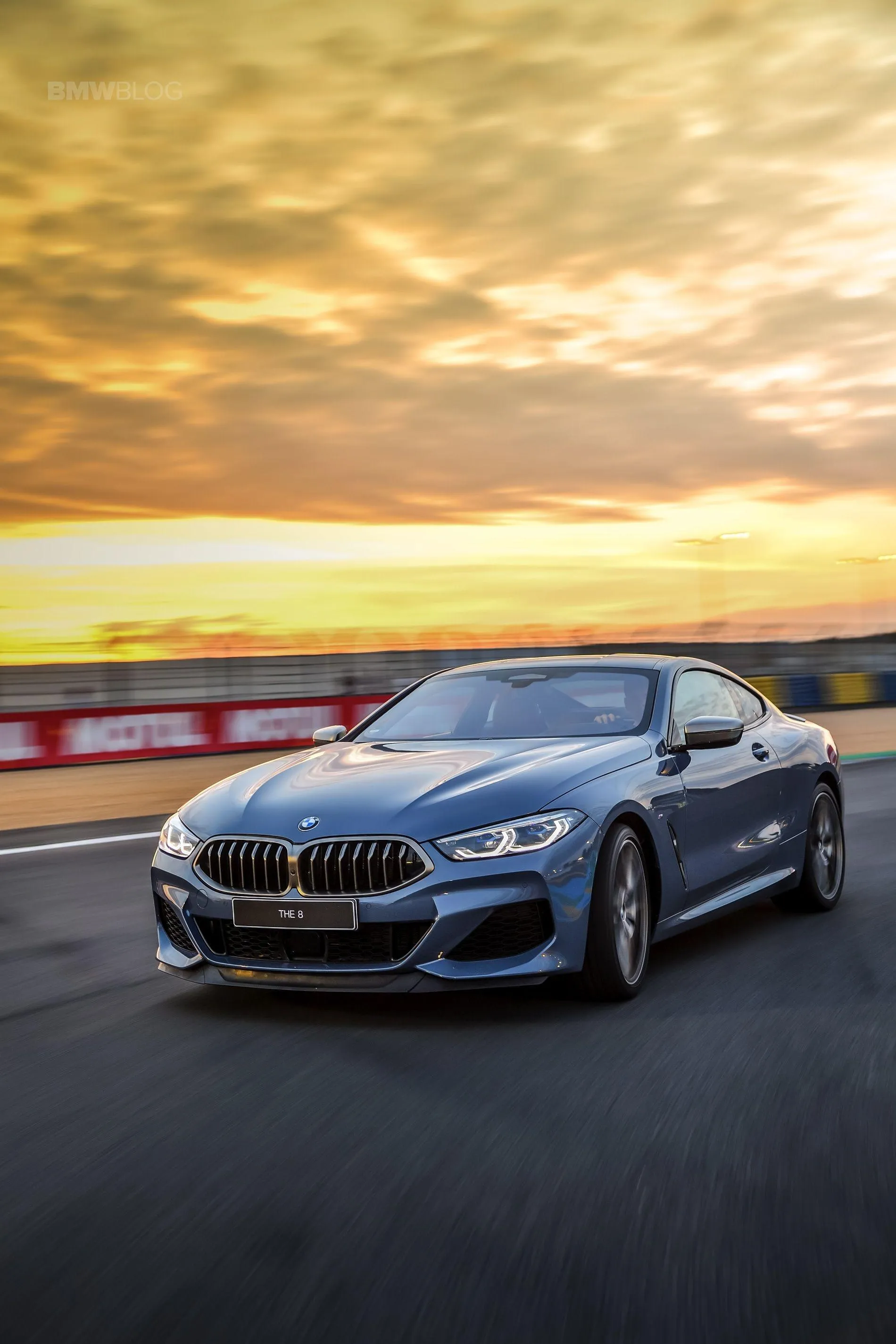 Bmw Driving on Track with Beautiful Sunset Background