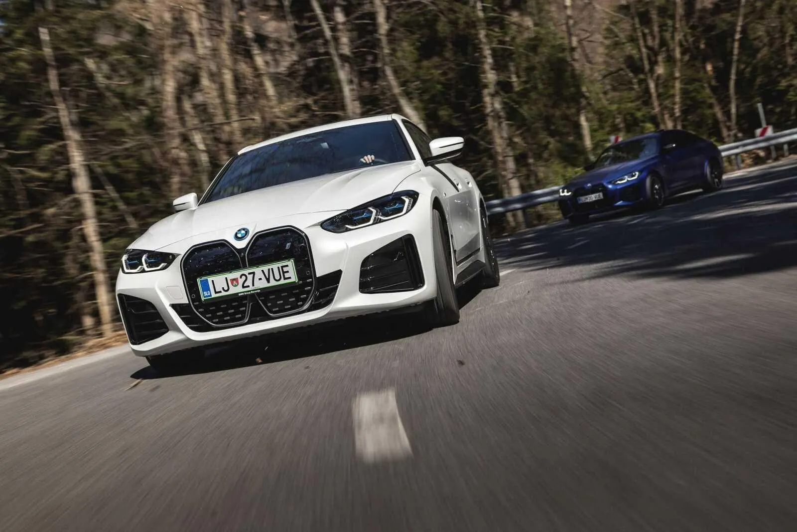 Bmw Driving Through Scenic Forest Roads Showcasing Agility