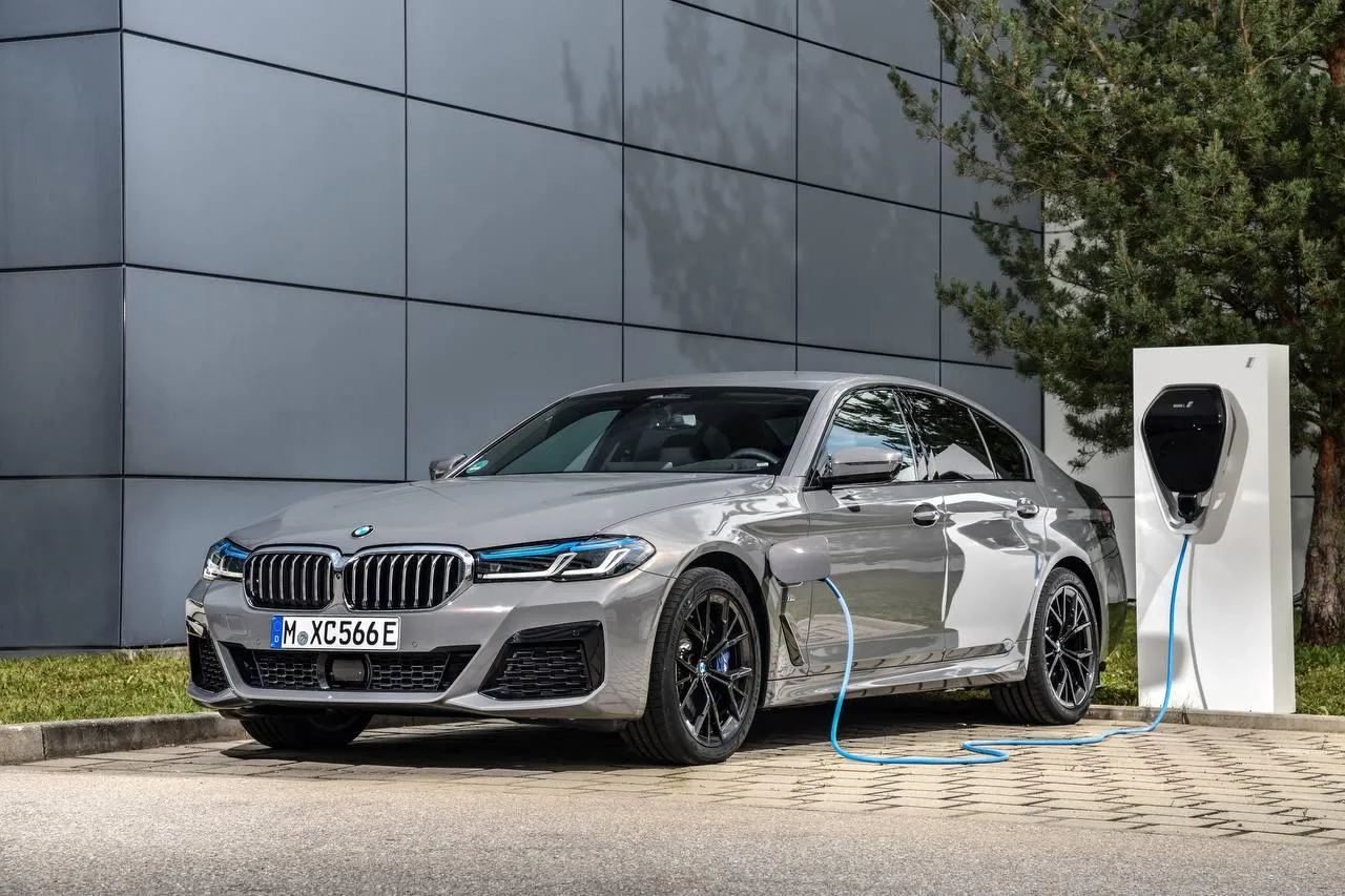 Bmw Electric Car Charging at Station with Sleek Design