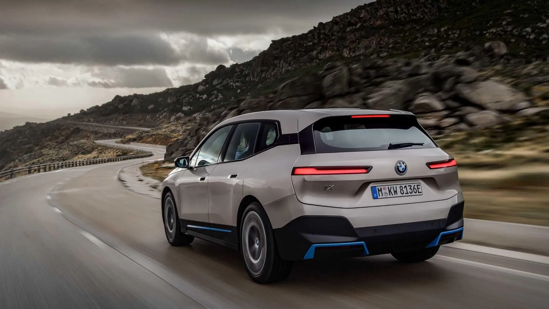 Bmw Electric Car Driving on a Winding Mountain Road