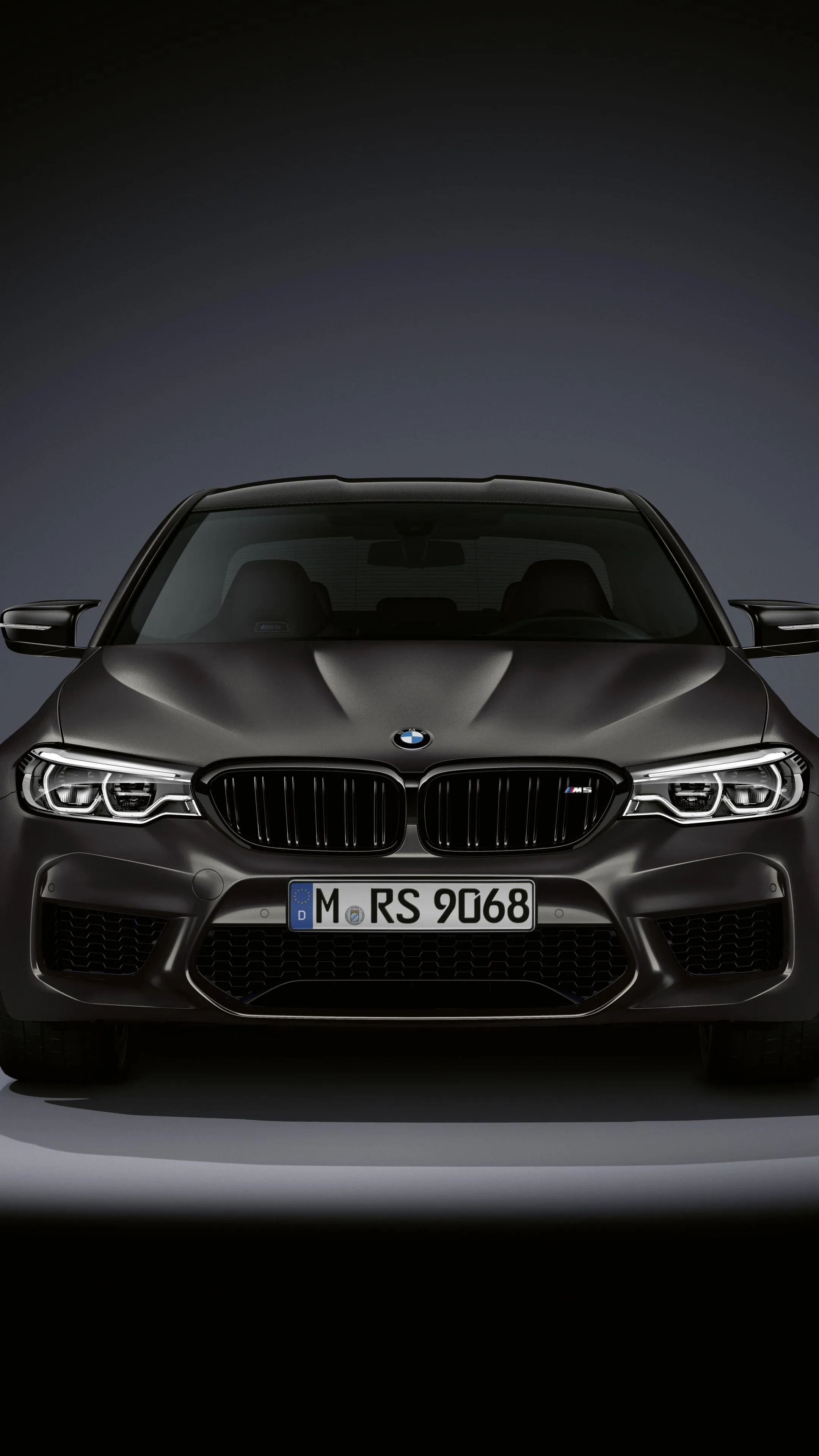 Bmw Front View in Moody Lighting Showcasing Car Details