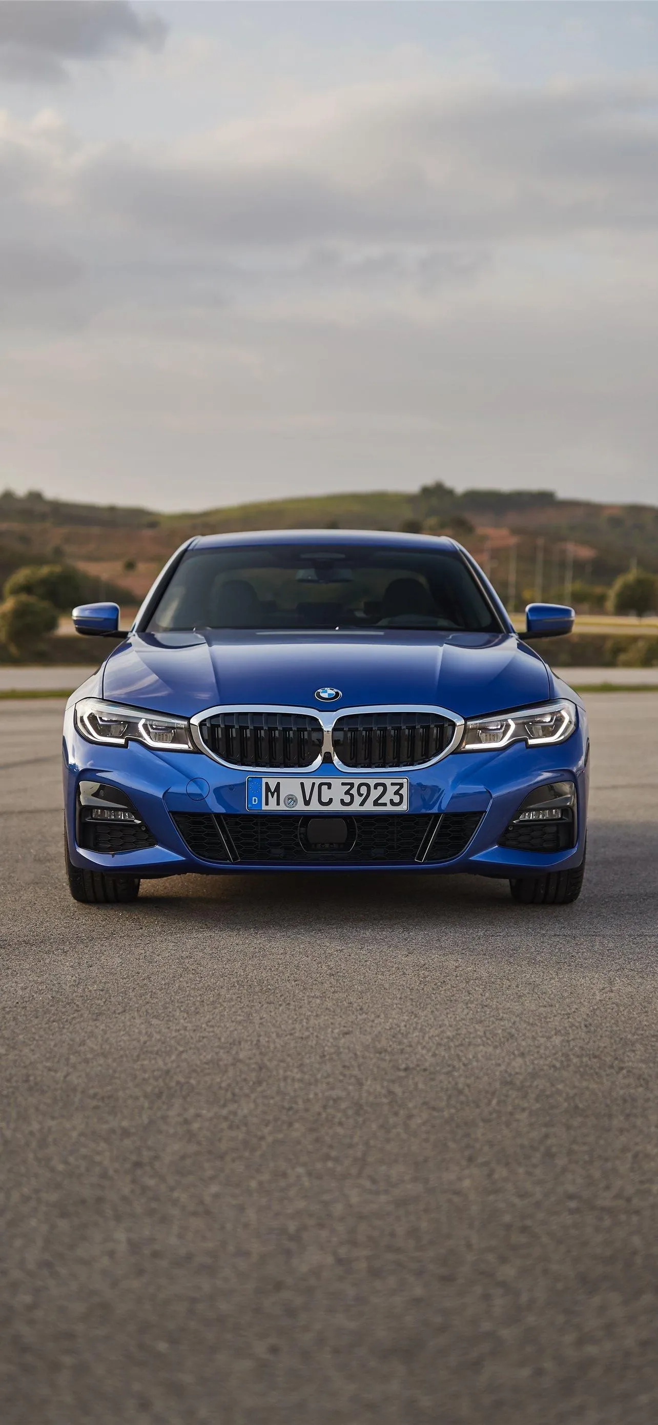 Bmw Front View on Road with Hills in Background Image Hd