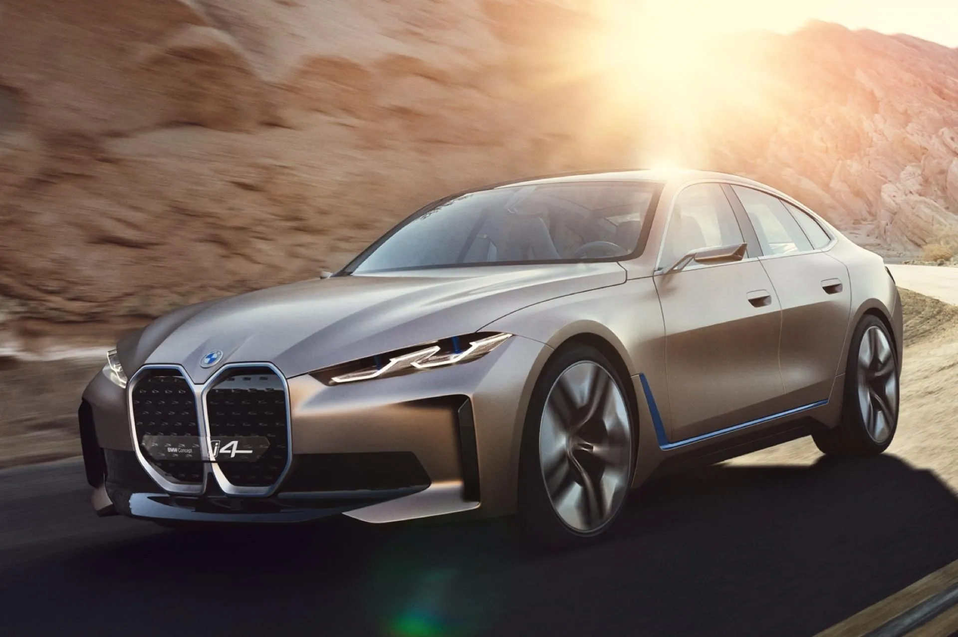 Bmw I4 Electric Car Driving on a Curvy Mountain Road
