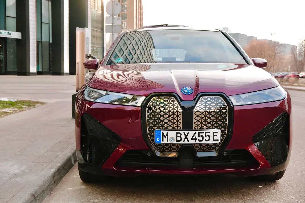 Bmw I4 Sedan Driving on a Quiet Road with Dynamic Design