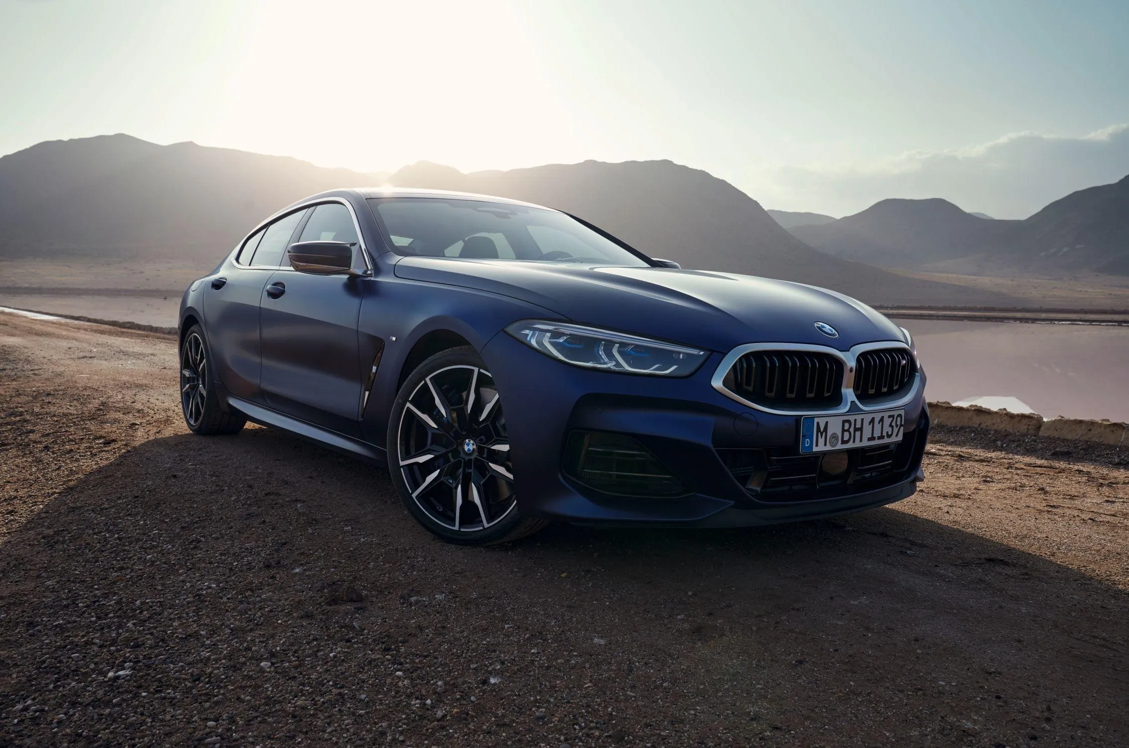 Bmw Luxury Sedan Driving in Scenic Mountainous Terrain