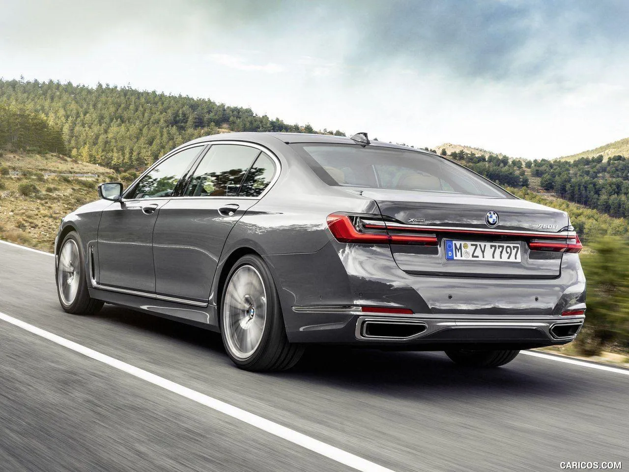Bmw Luxury Sedan Driving on a Scenic Mountain Road