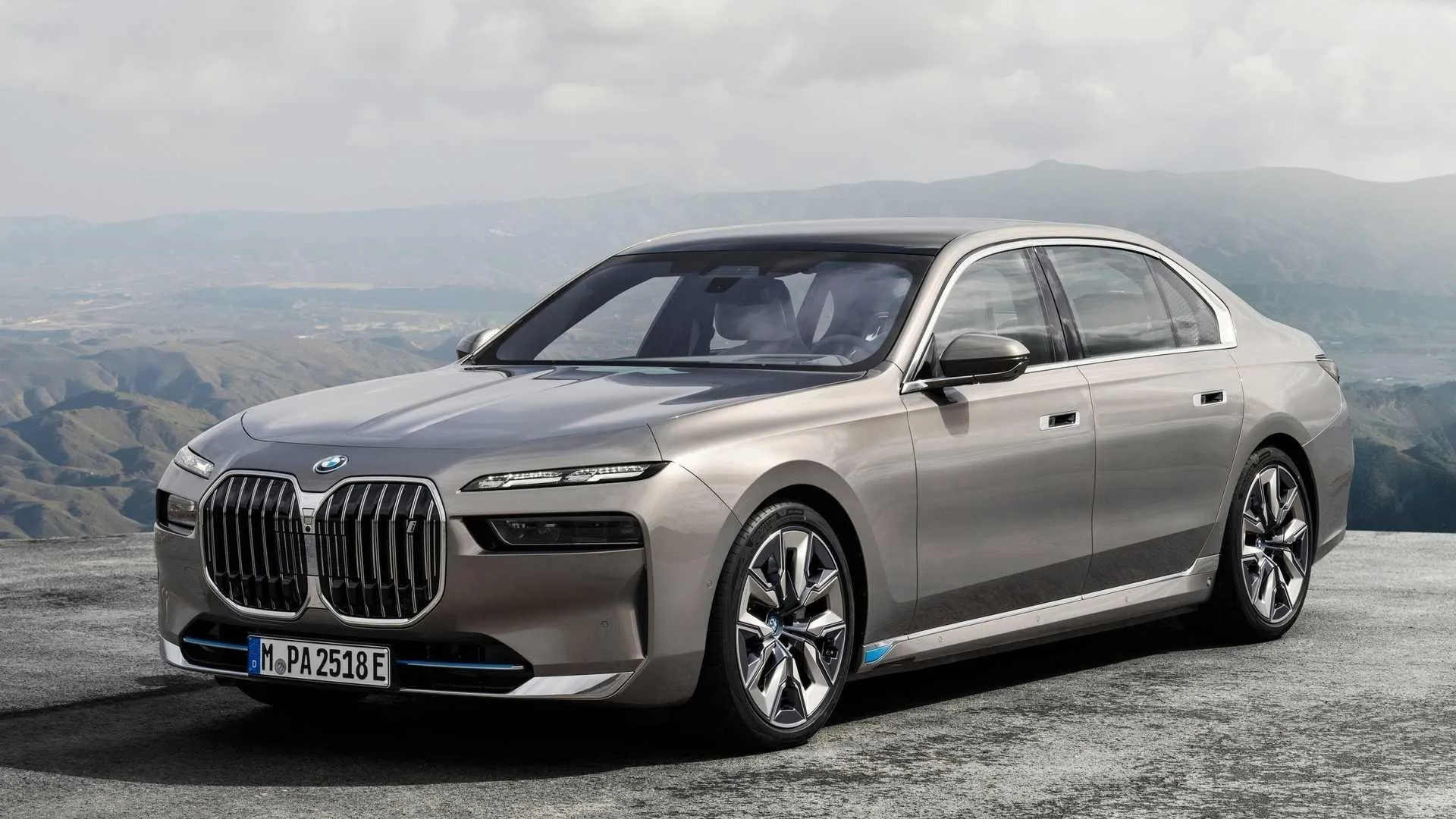 Bmw Luxury Sedan Parked on a Hilltop with a View Wallpaper