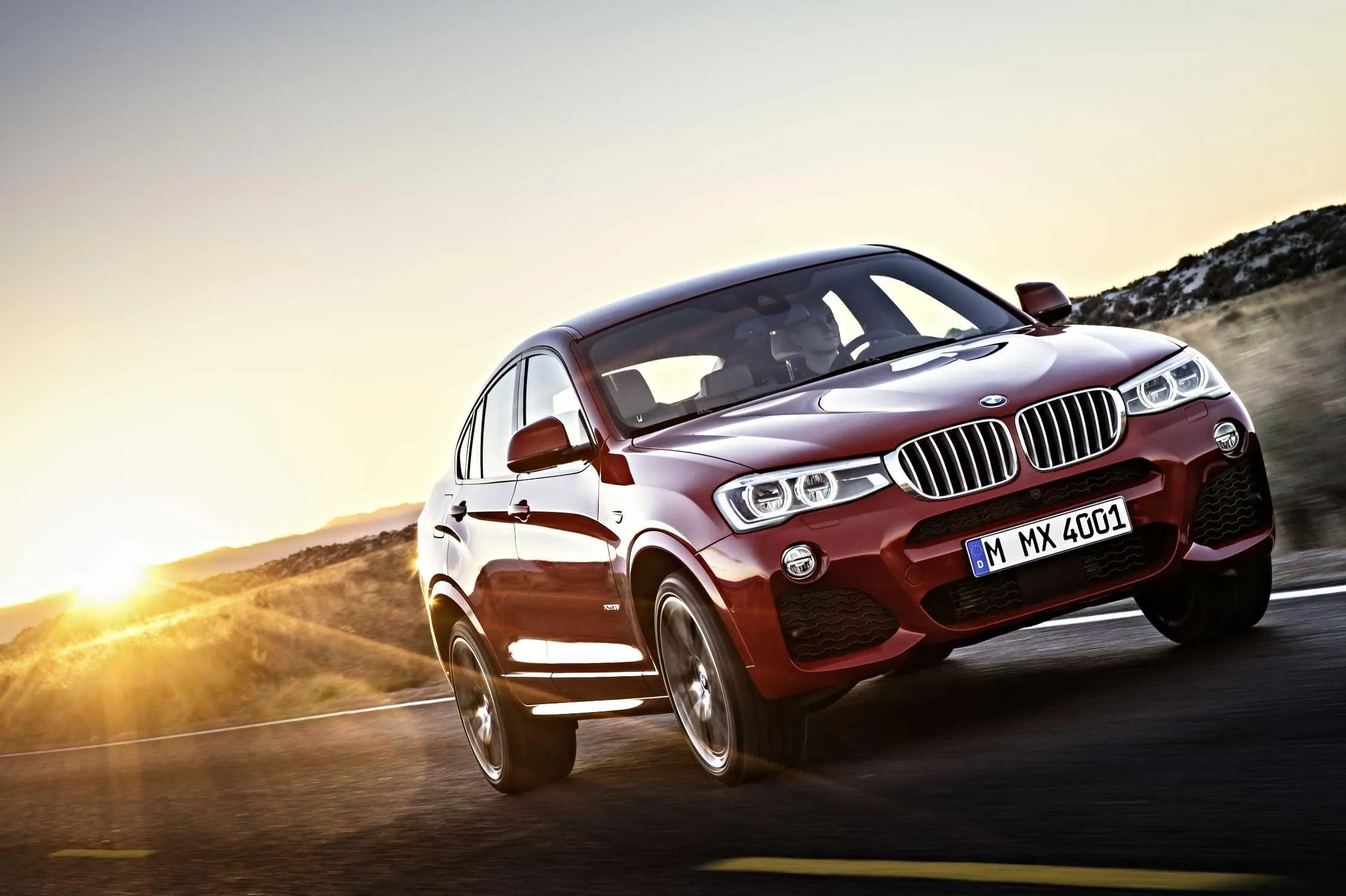 Bmw Luxury Suv on Open Road with Wide Horizon and Mountain