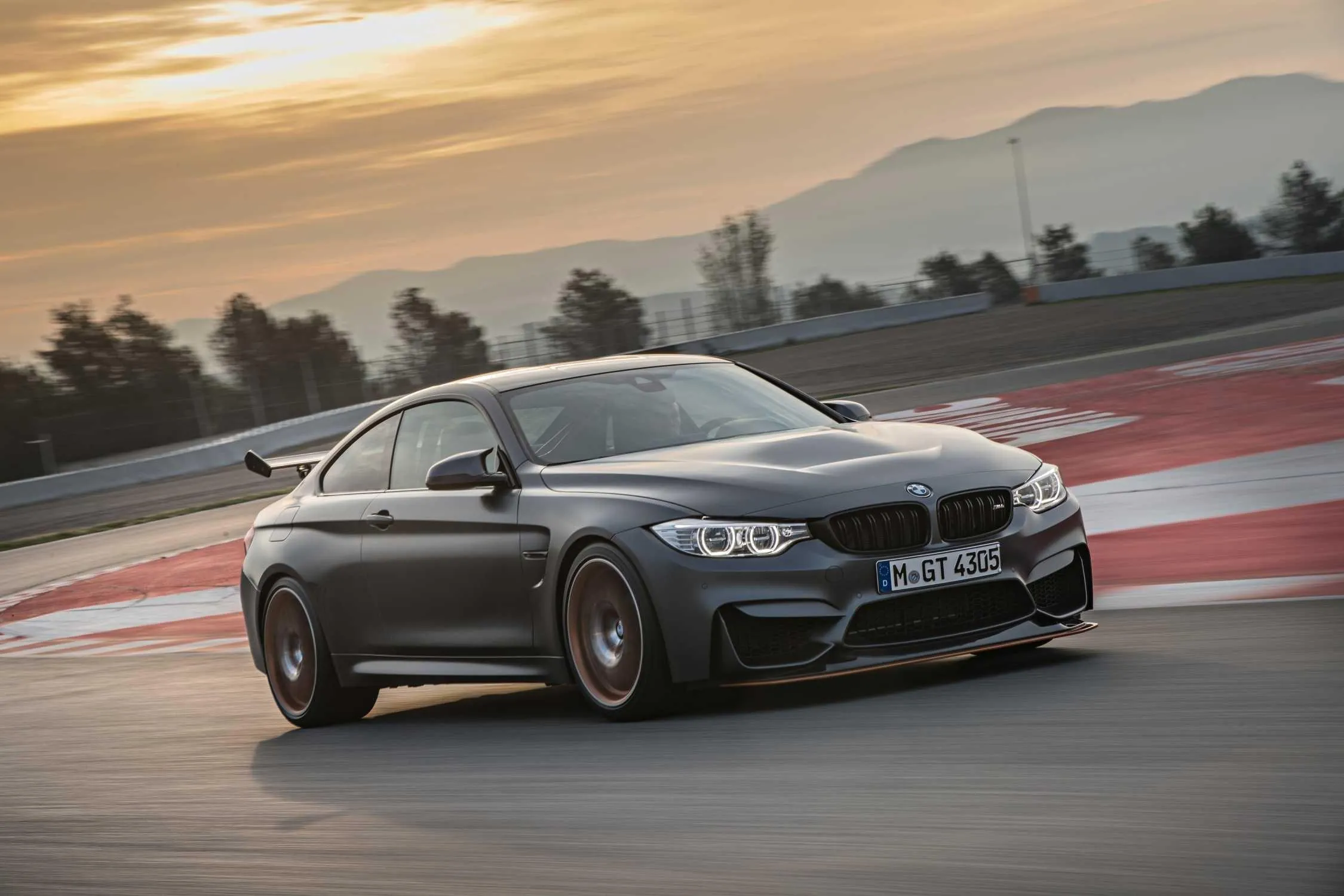 Bmw M Performance Sedan Speeding Past City Skyline