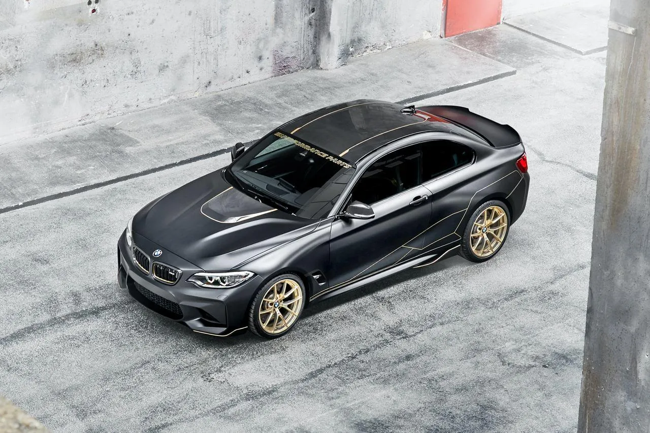 Bmw M4 Coupe Parked in a Concrete Space with Bold Styling