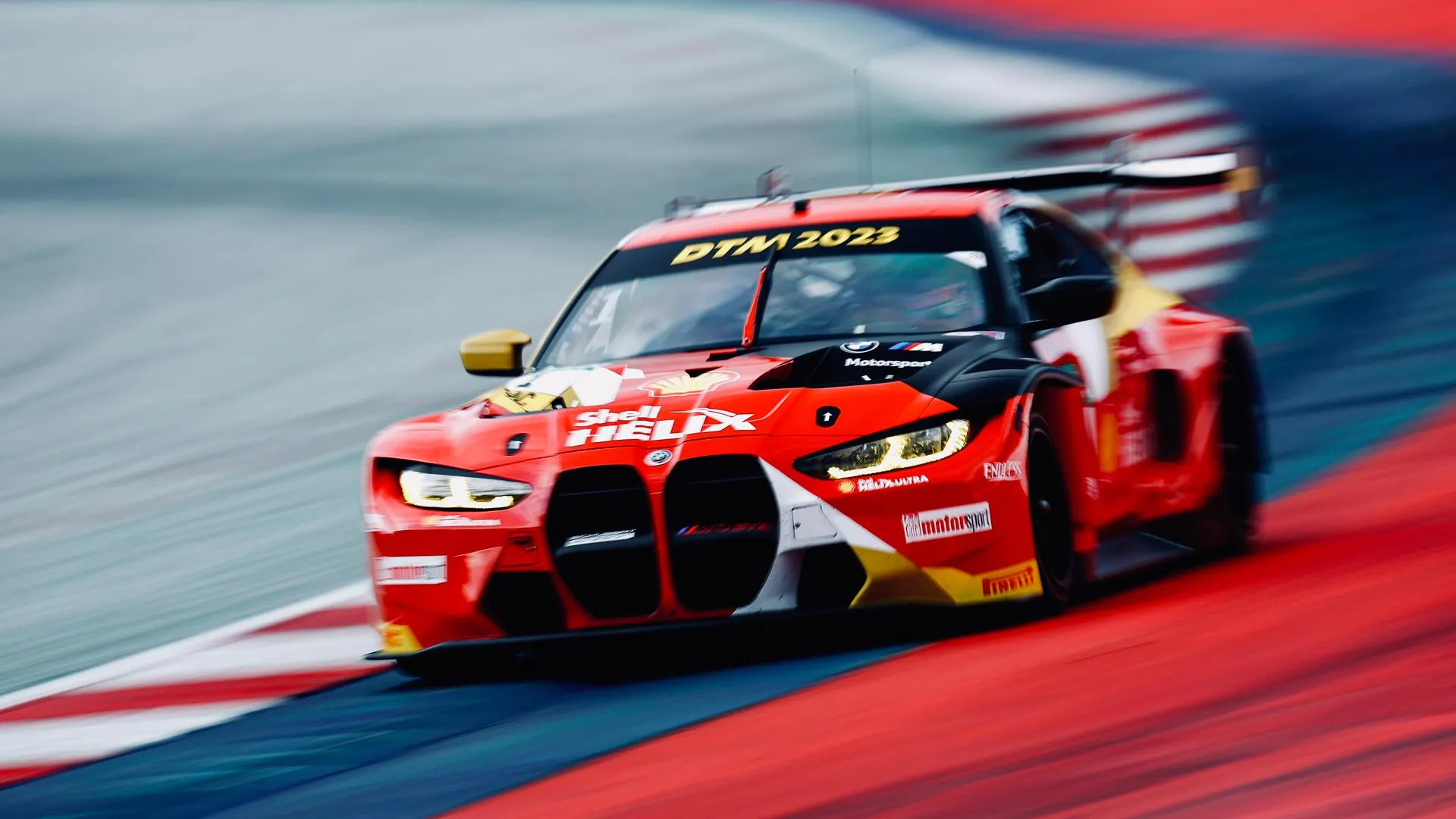 Bmw M4 Gt3 Racing on a Track with Motion Blur