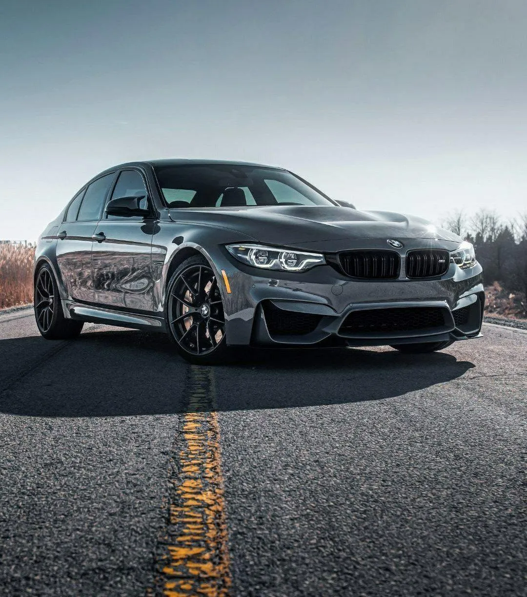 Bmw M4 with Bold Design Parked at a Racetrack For a Photo