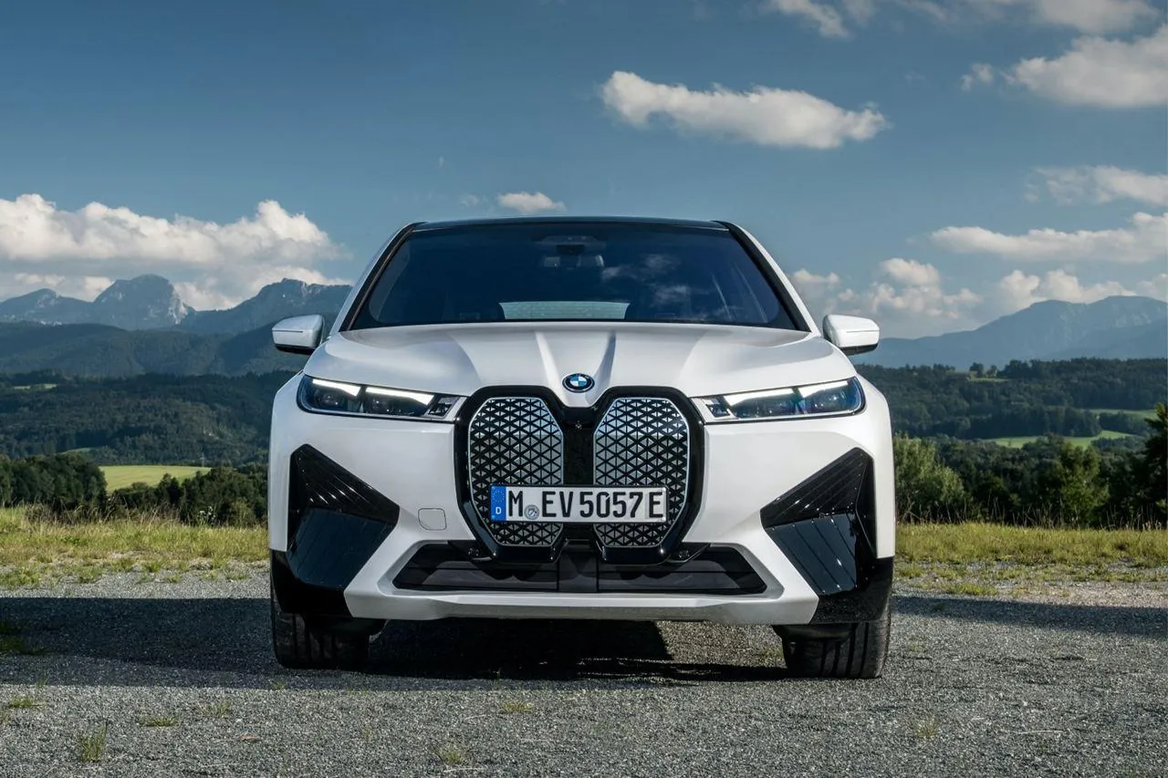 Bmw Modern Sedan Driving on Rocky Terrain with Views