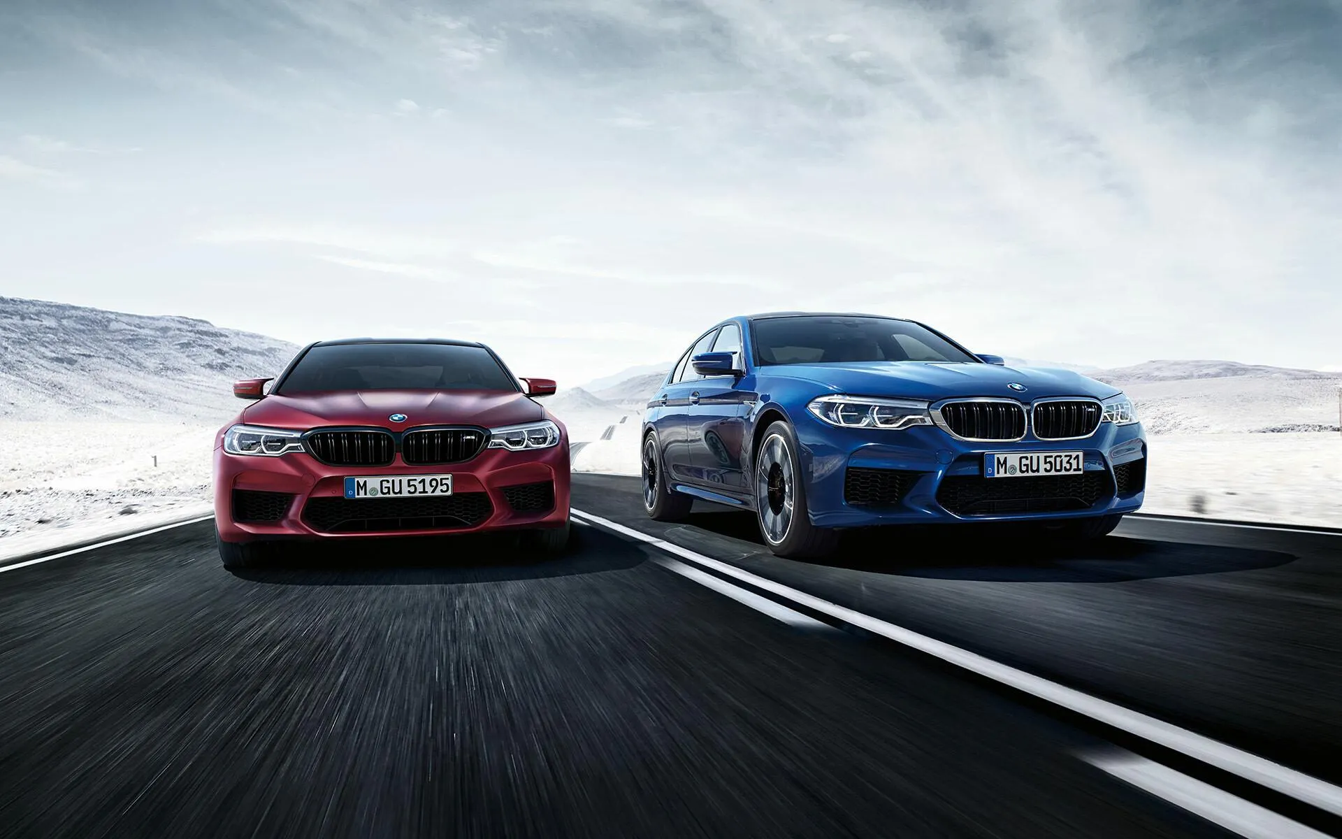 Bmw on Snowy Road with Red and Blue Cars Racing Together