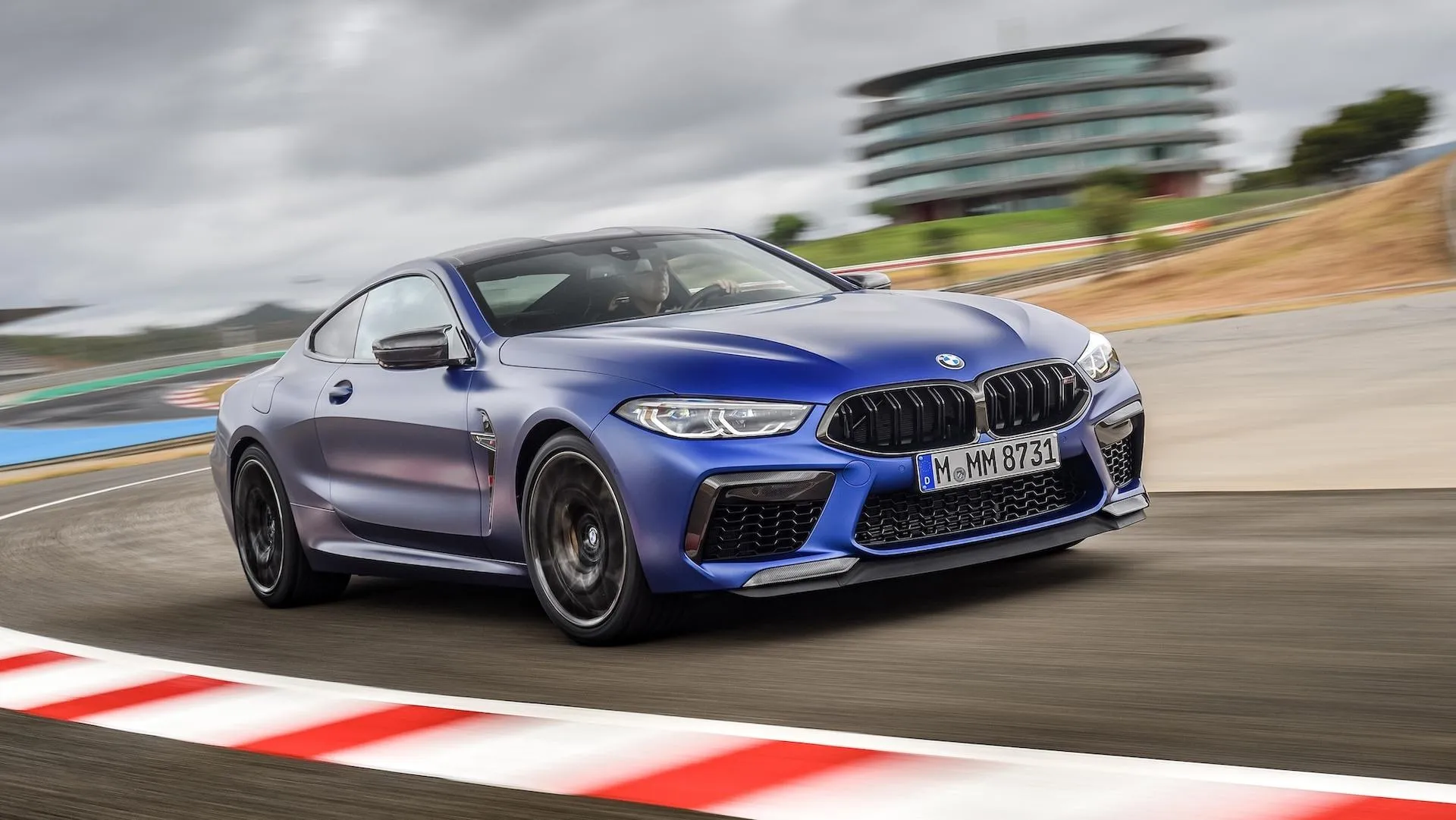 Bmw Performance Car Racing on a Track at Full Speed