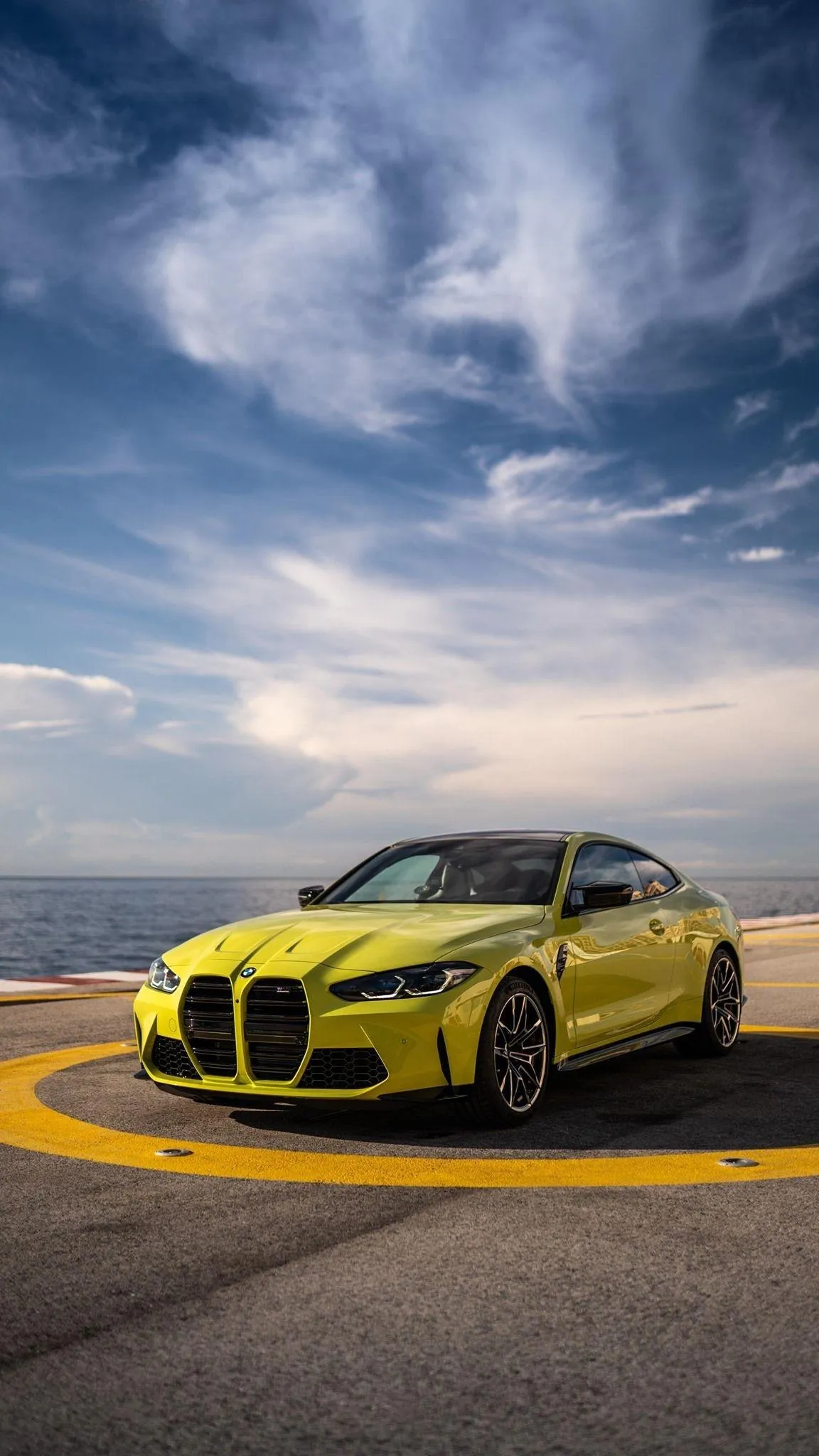 Bmw Performance Car Speeding Along a Coastal Highway