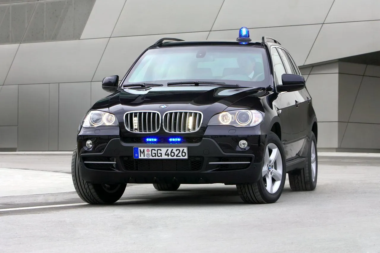 Bmw Police Suv Parked Outside Modern Building Image