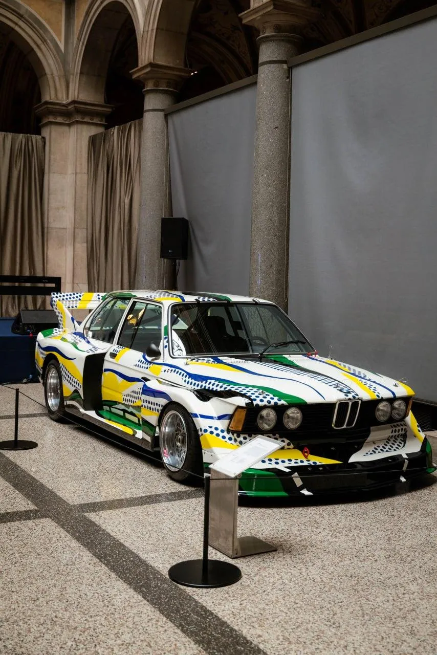 Bmw Race Car Displayed at an Indoor Auto Exhibition