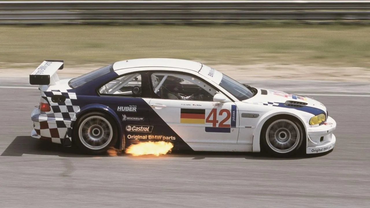Bmw Race Car Drifting on Track with Flames From Exhaust
