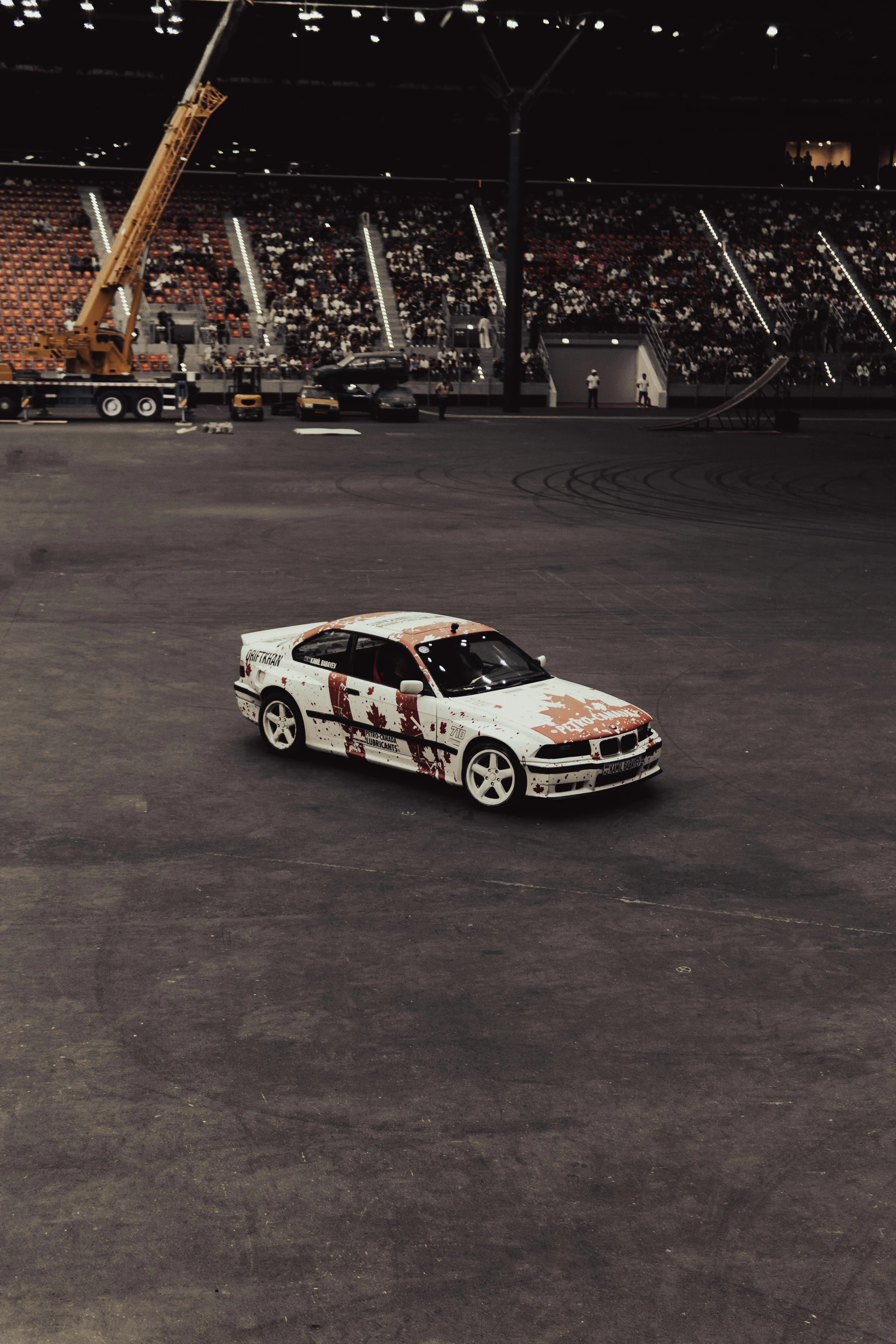 Bmw Race Car Driving Alone on a Large Track Surface