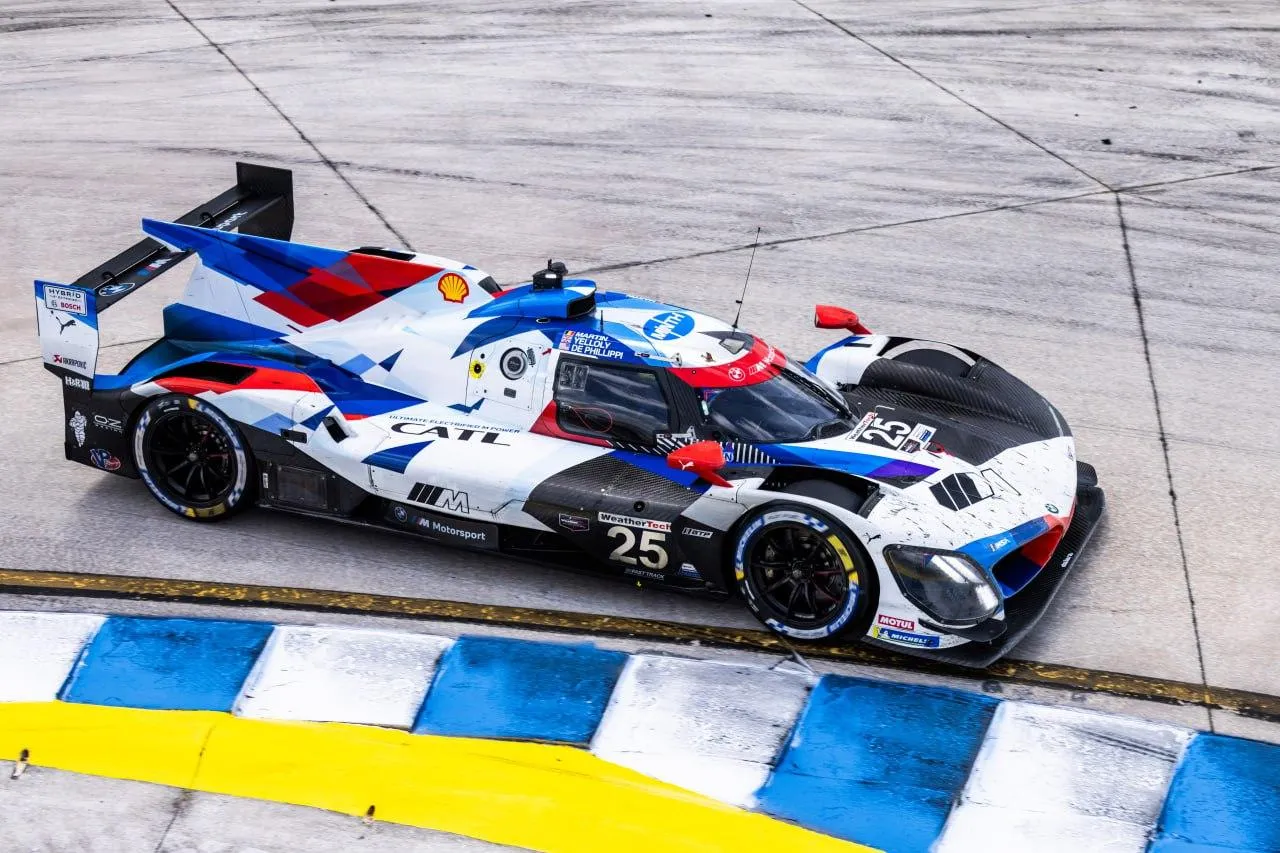 Bmw Racing Car in Action on a Race Track with Colorful Lines
