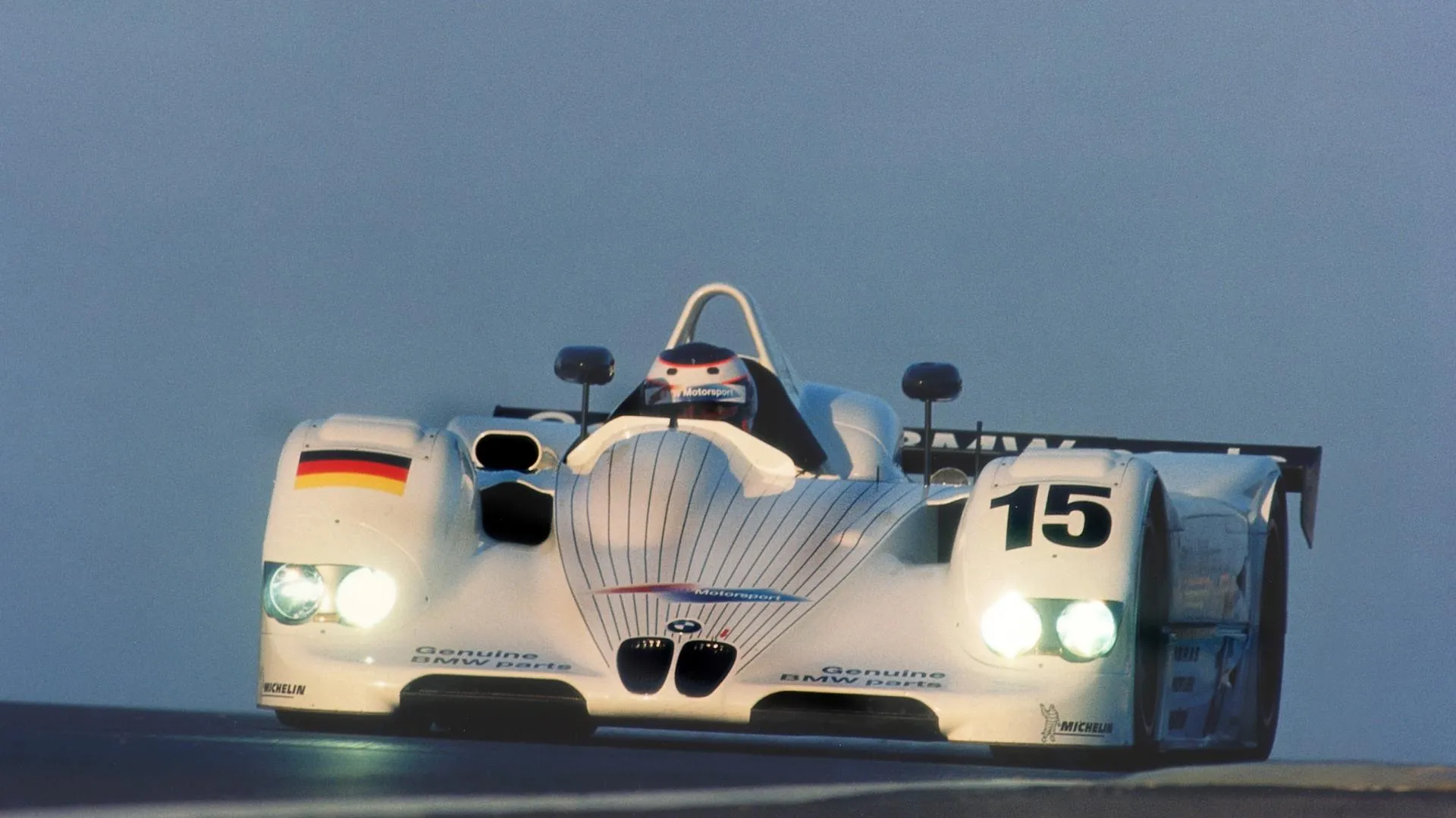 Bmw Racing Car Participating in a High Speed Motorsport Event