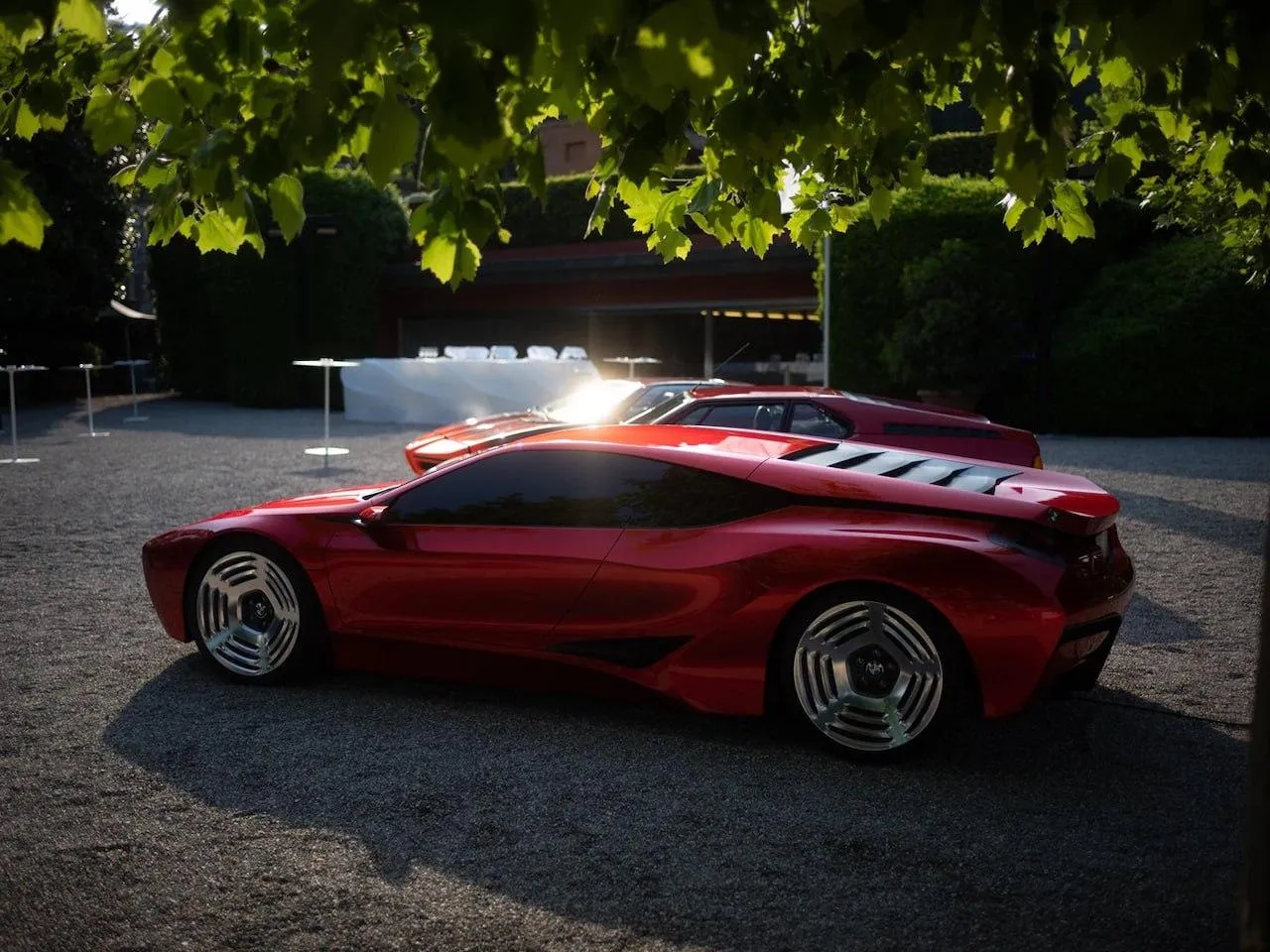 Bmw Red Concept Car on Road Surrounded By Green Trees