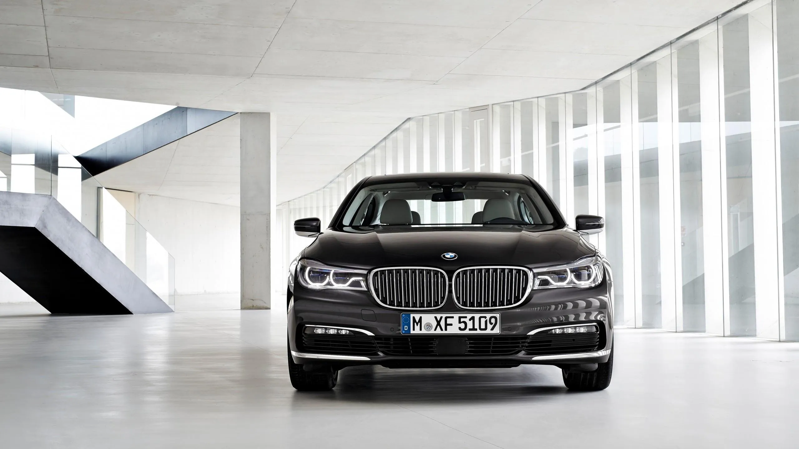 Bmw Sedan Displayed Inside Modern Minimalist White Building