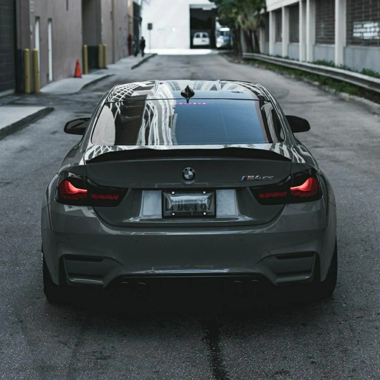 Bmw Sedan in Rear View on Urban Street Hd Wallpaper