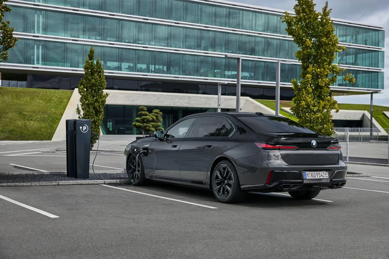 Bmw Sedan Parked in Front of Modern Building Image Hd