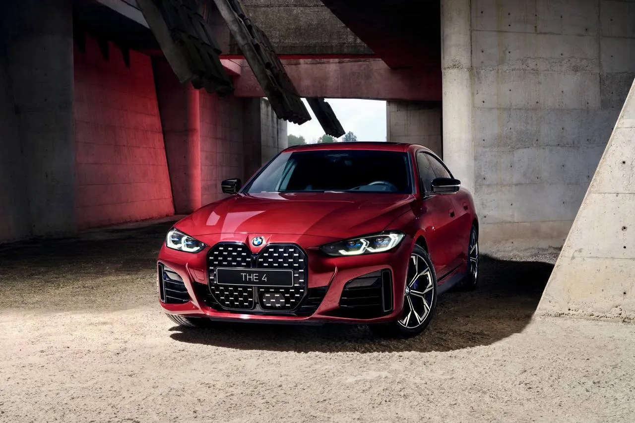 Bmw Sedan Parked in Modern Industrial Garage Space