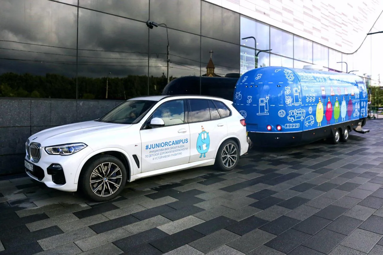 Bmw Self Driving Car Parked at Modern Facility Hd Image