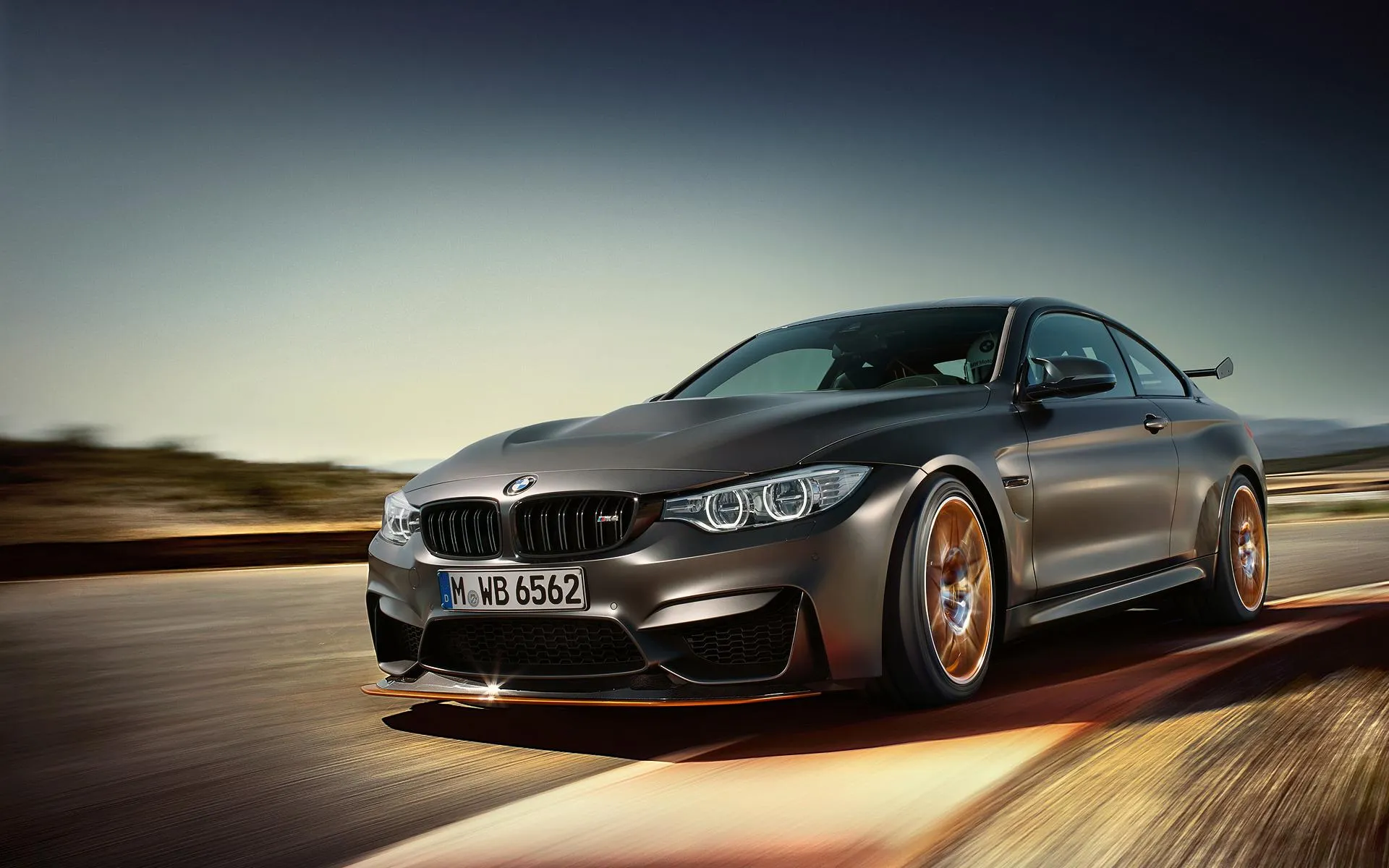 Bmw Speeding Down a Track with a Dynamic Driving Angle