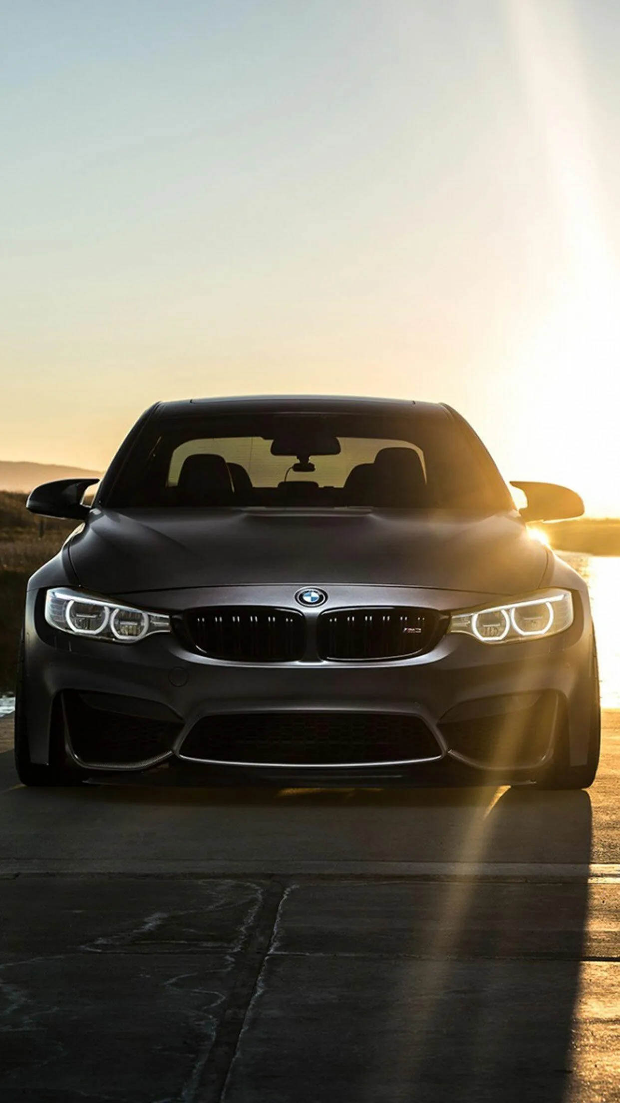 Bmw Sport Car on the Road with Stunning Sunset in Background
