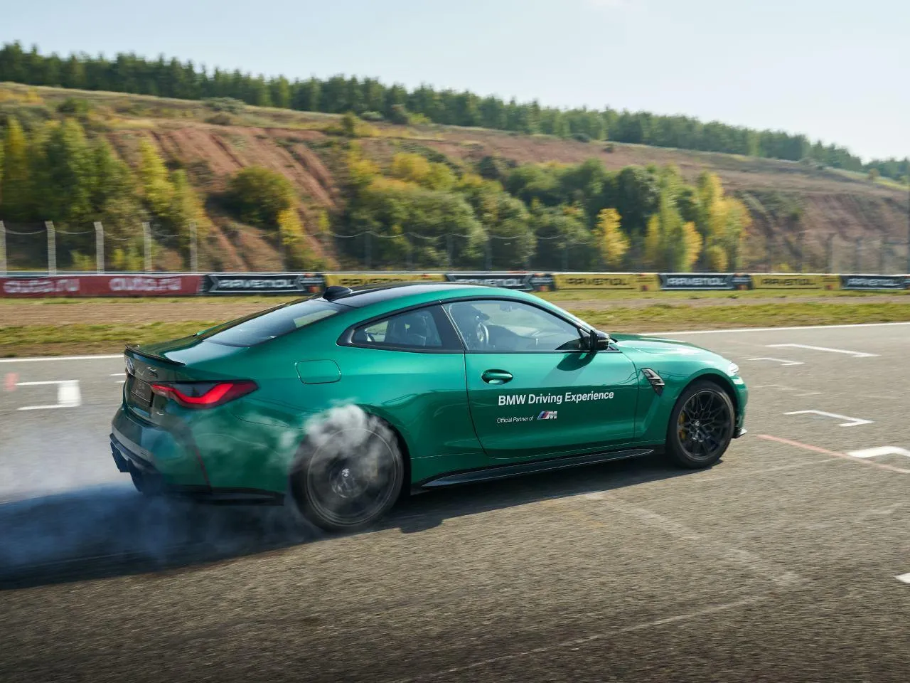 Bmw Sports Car Drifting on Track with Powerful Speed