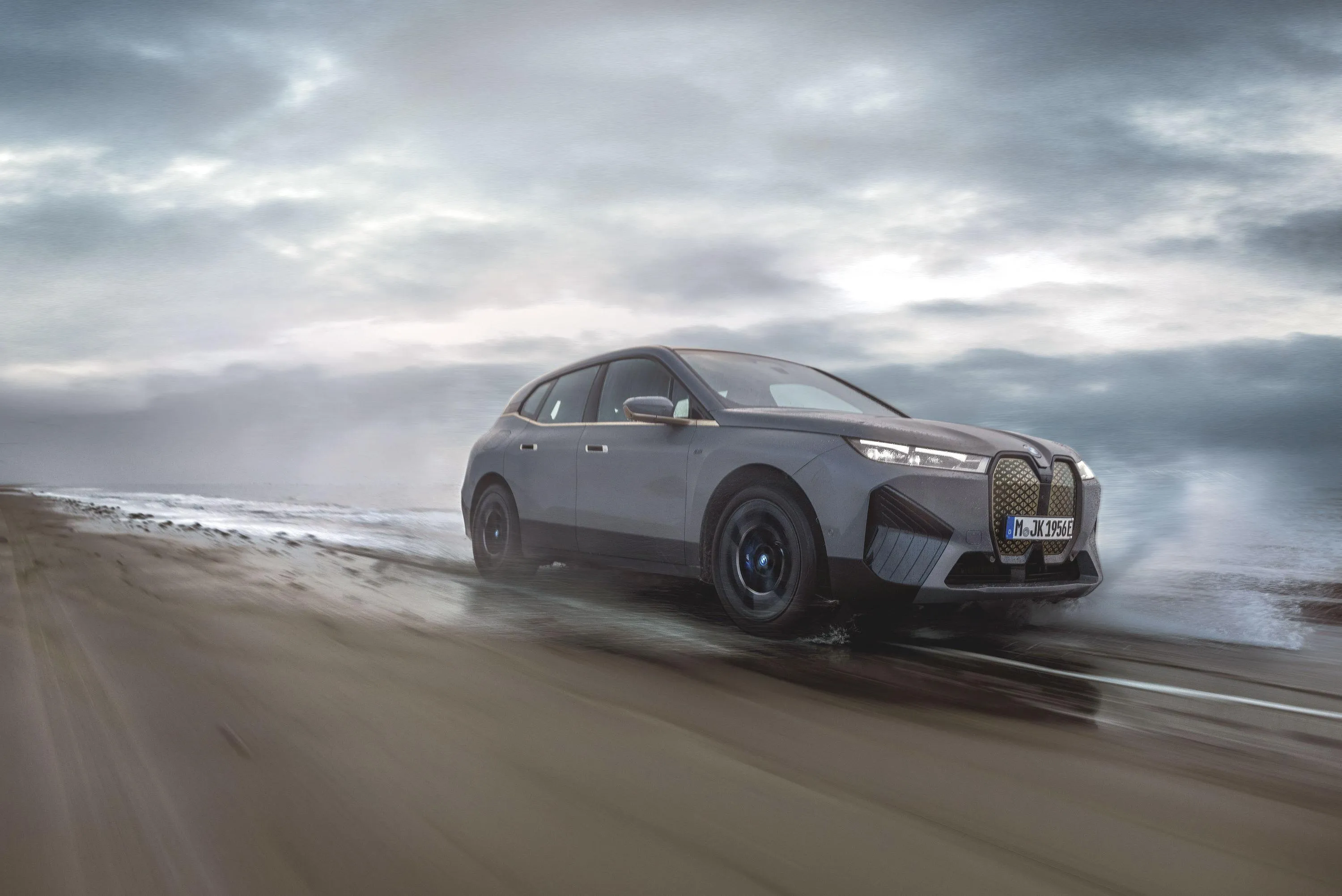 Bmw Sports Car Driving Fast on a Winding Road Hd Wallpaper