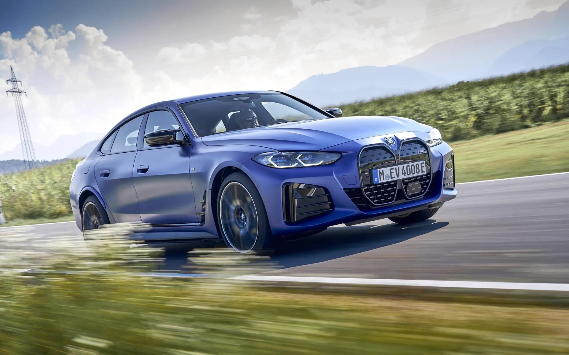 Bmw Sports Car in Motion on Track with Blurred Trees