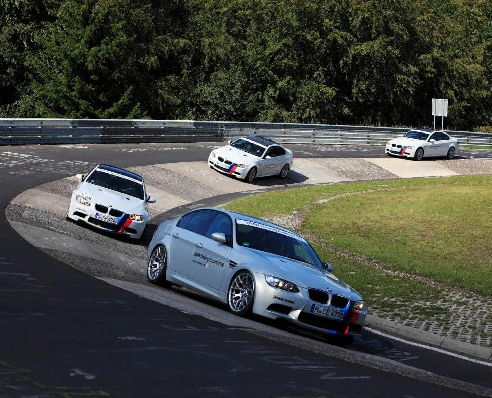 Bmw Sports Car Taking a Sharp Turn on Scenic Mountain Road