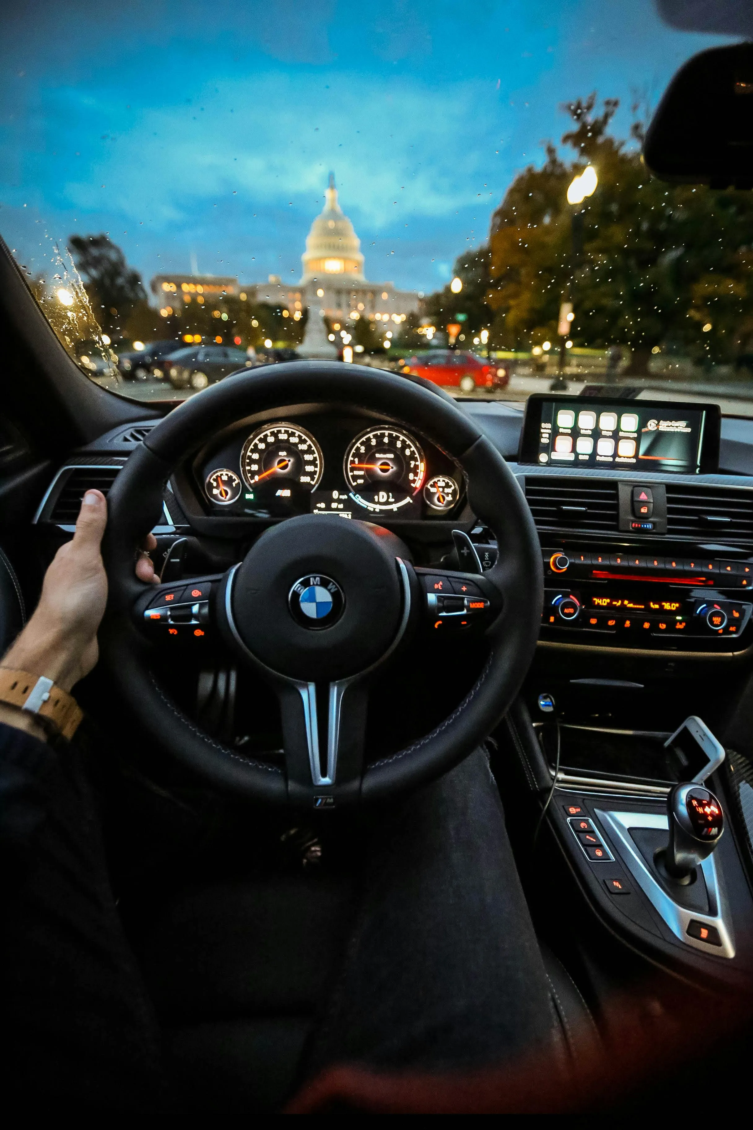 Bmw Steering View Driving Toward Monument at Sunset