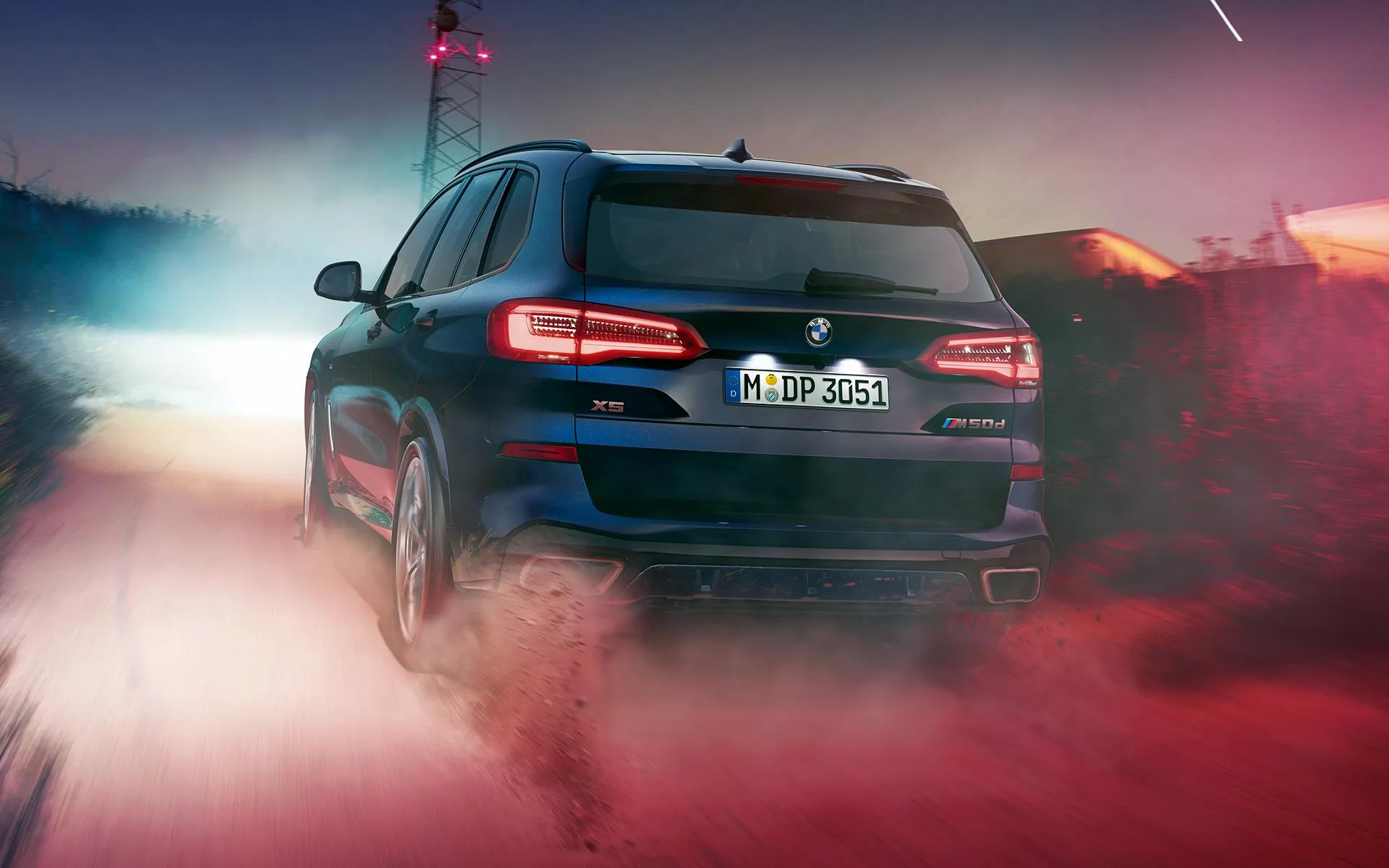 Bmw Suv Driving Away Through Thick Red Colored Smoke