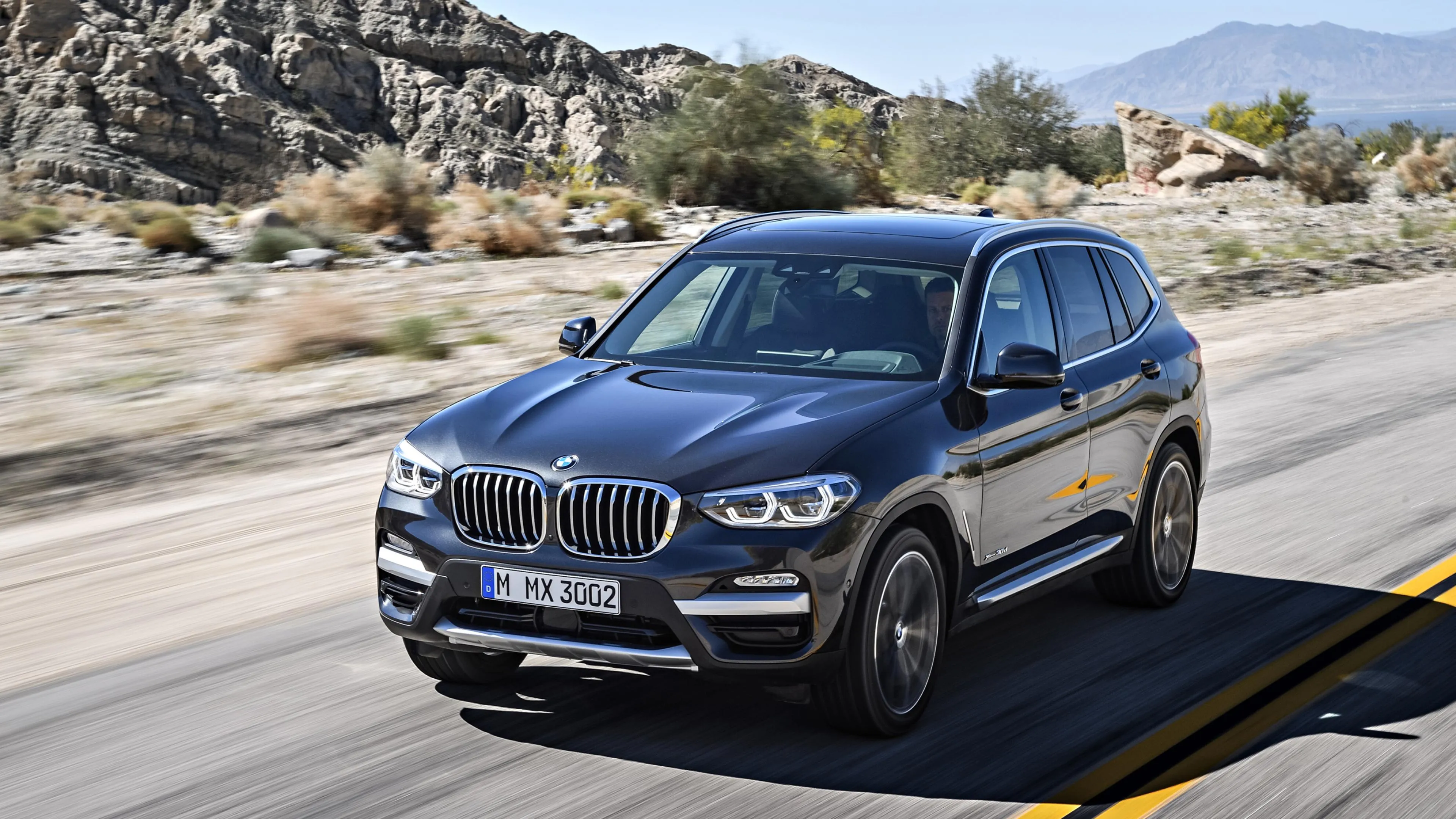 Bmw Suv Driving Fast on Mountain Road with Blur Motion Effect