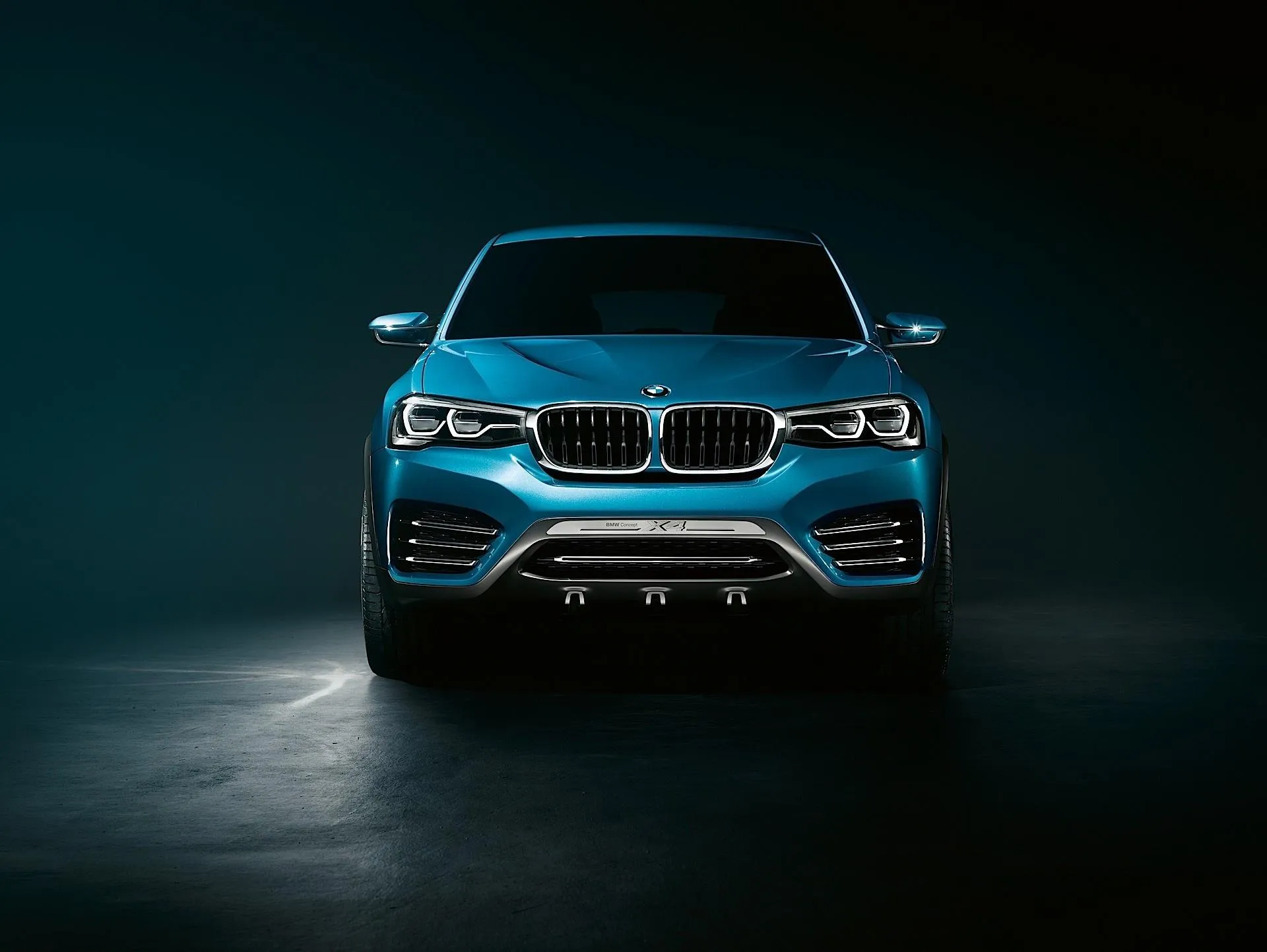 Bmw Suv in Dark Lighting with Sleek Front View Wallpaper