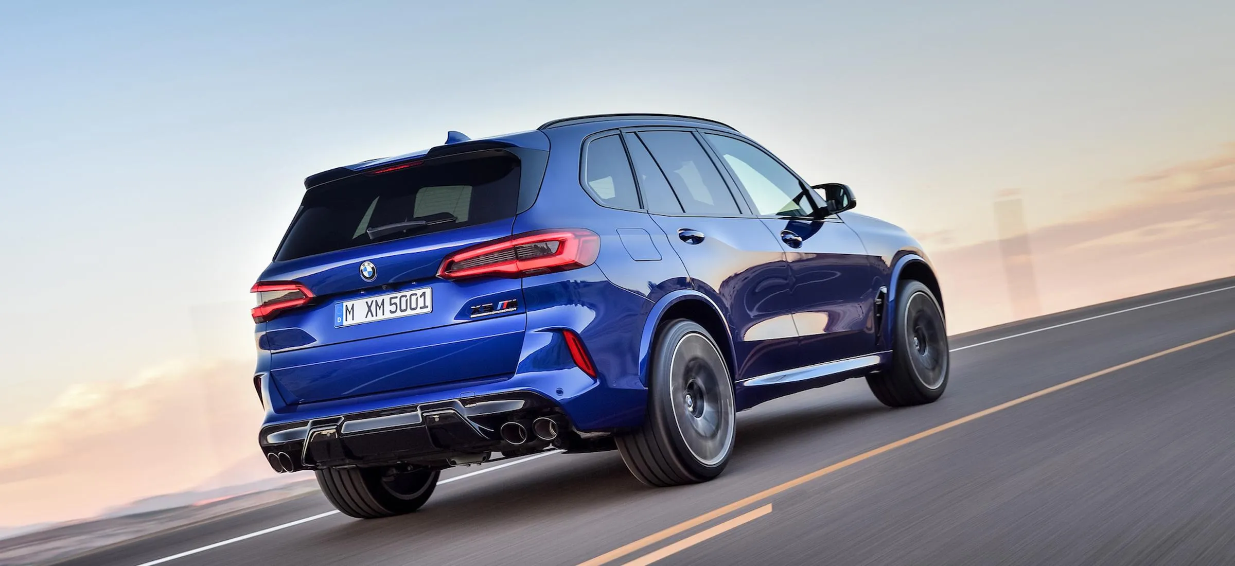 Bmw Suv in Racing Mode on Open Highway with Scenic View
