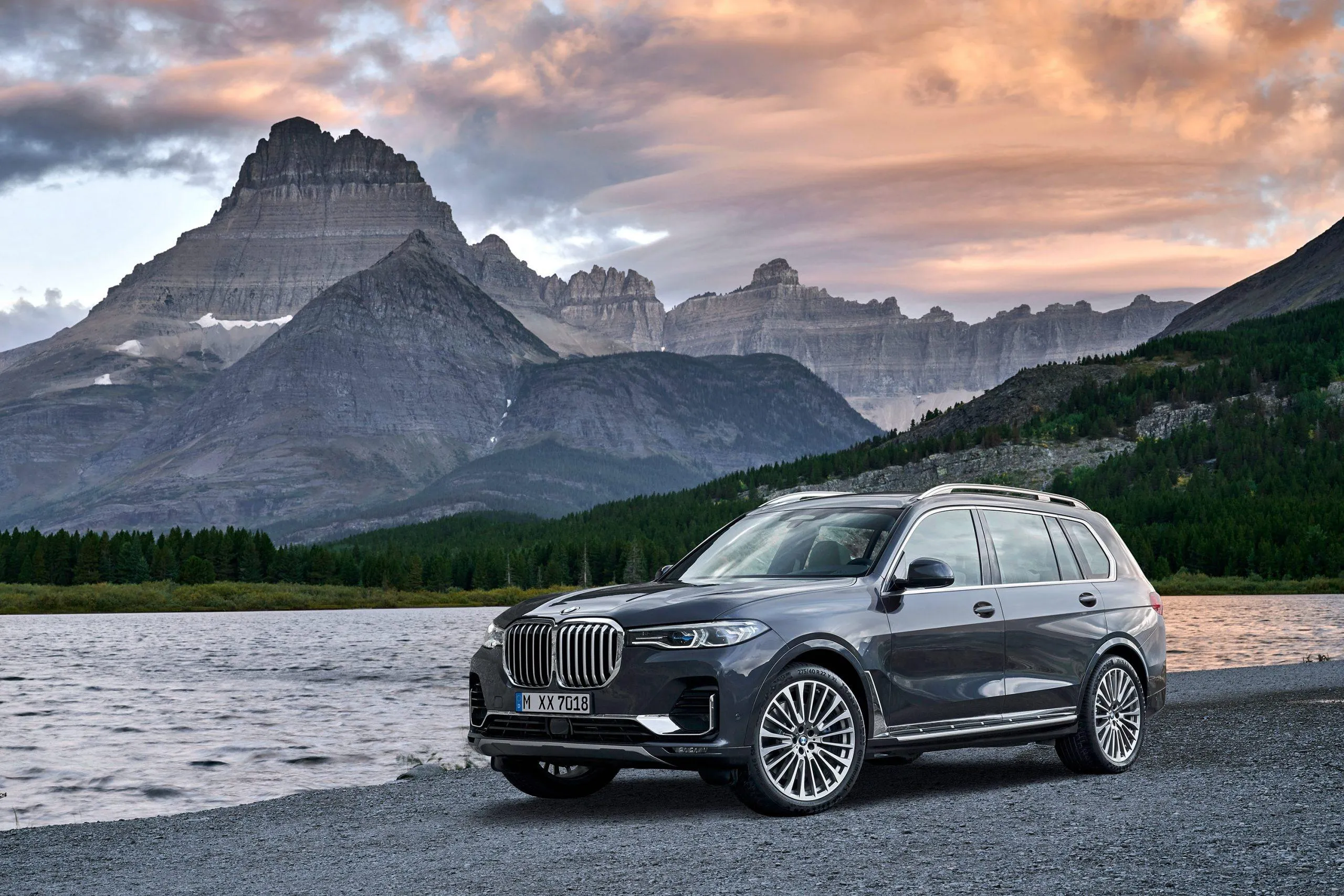 Bmw Suv Parked By a Lake with Majestic Mountain View