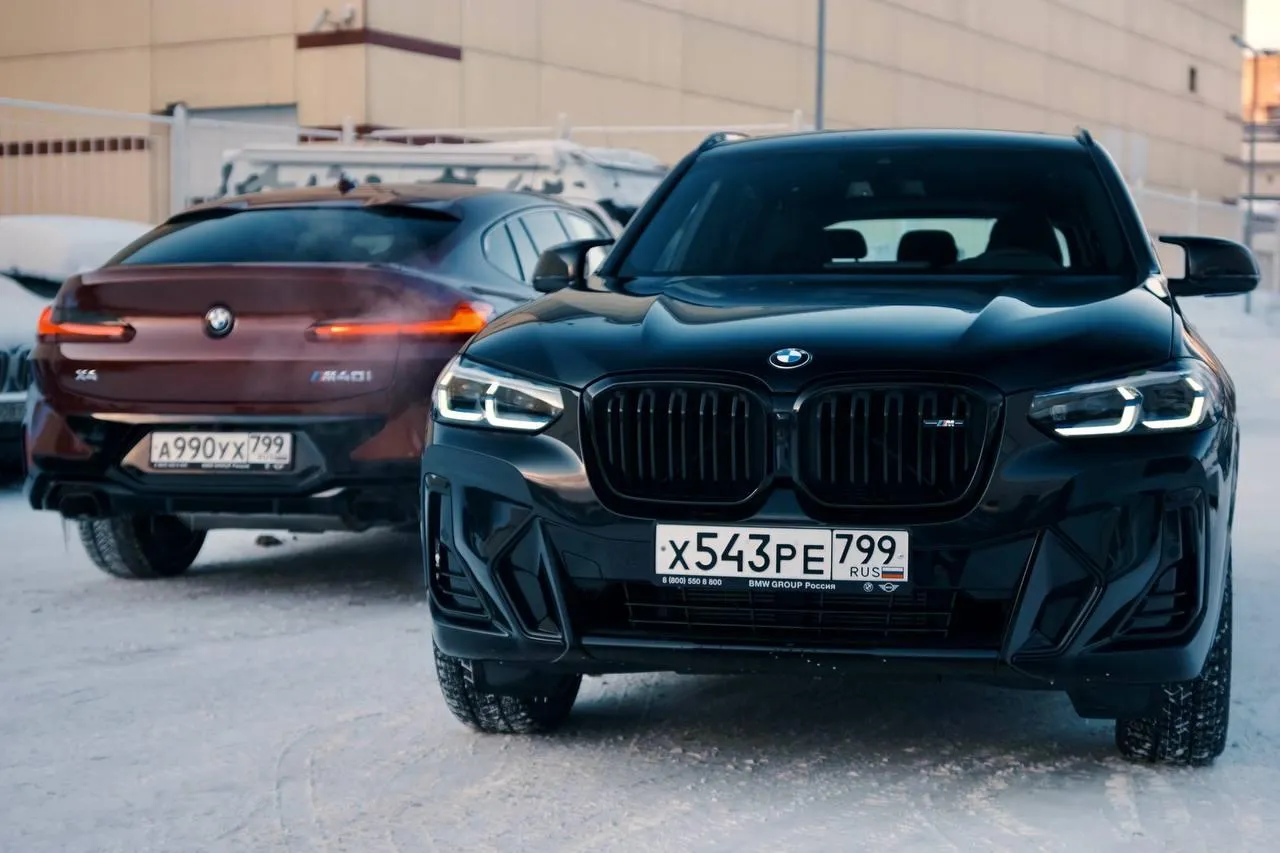 Bmw Suvs Parked in Snow Covered Urban Area in Winter