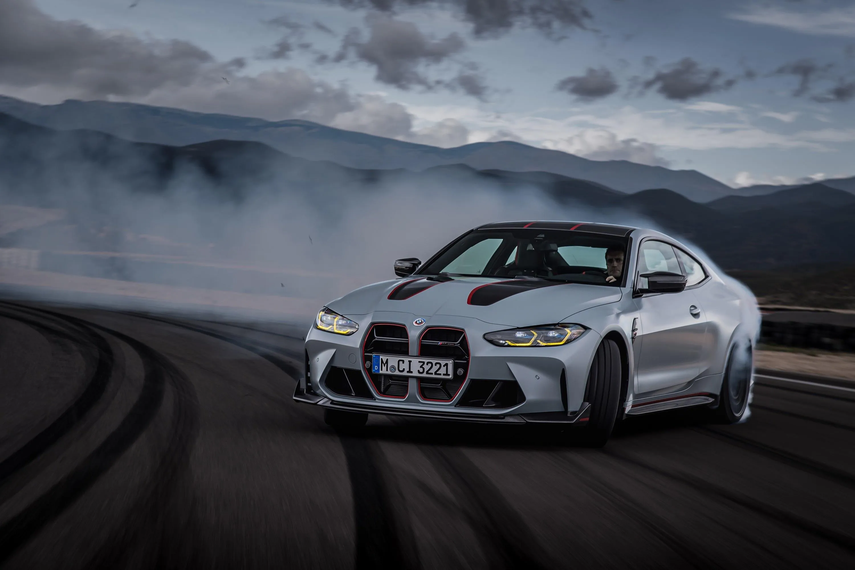 Bmw White Car Drifting on Track Producing Smoke Wallpaper