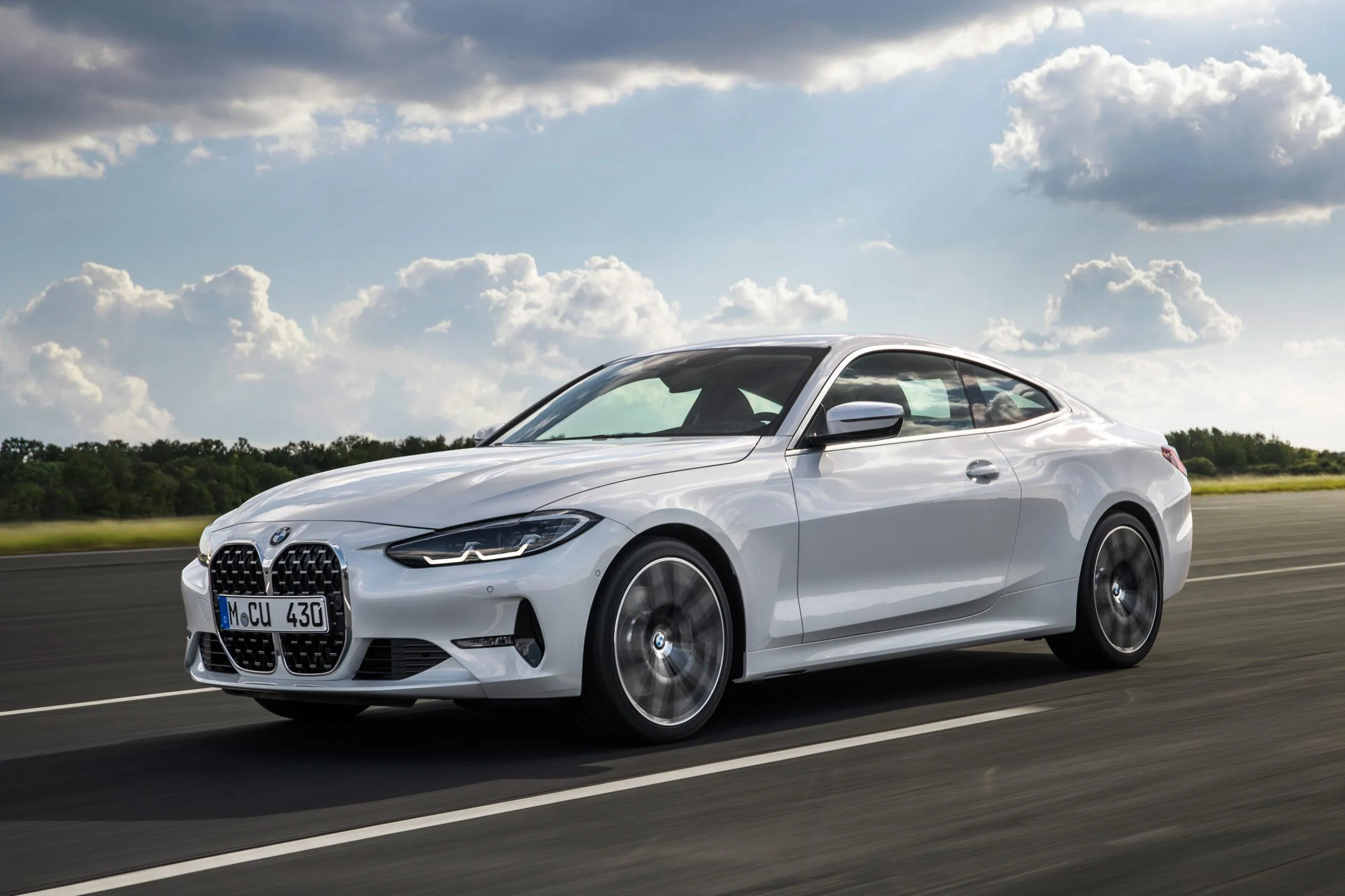 Bmw White Convertible Driving on Open Road Under Blue Sky