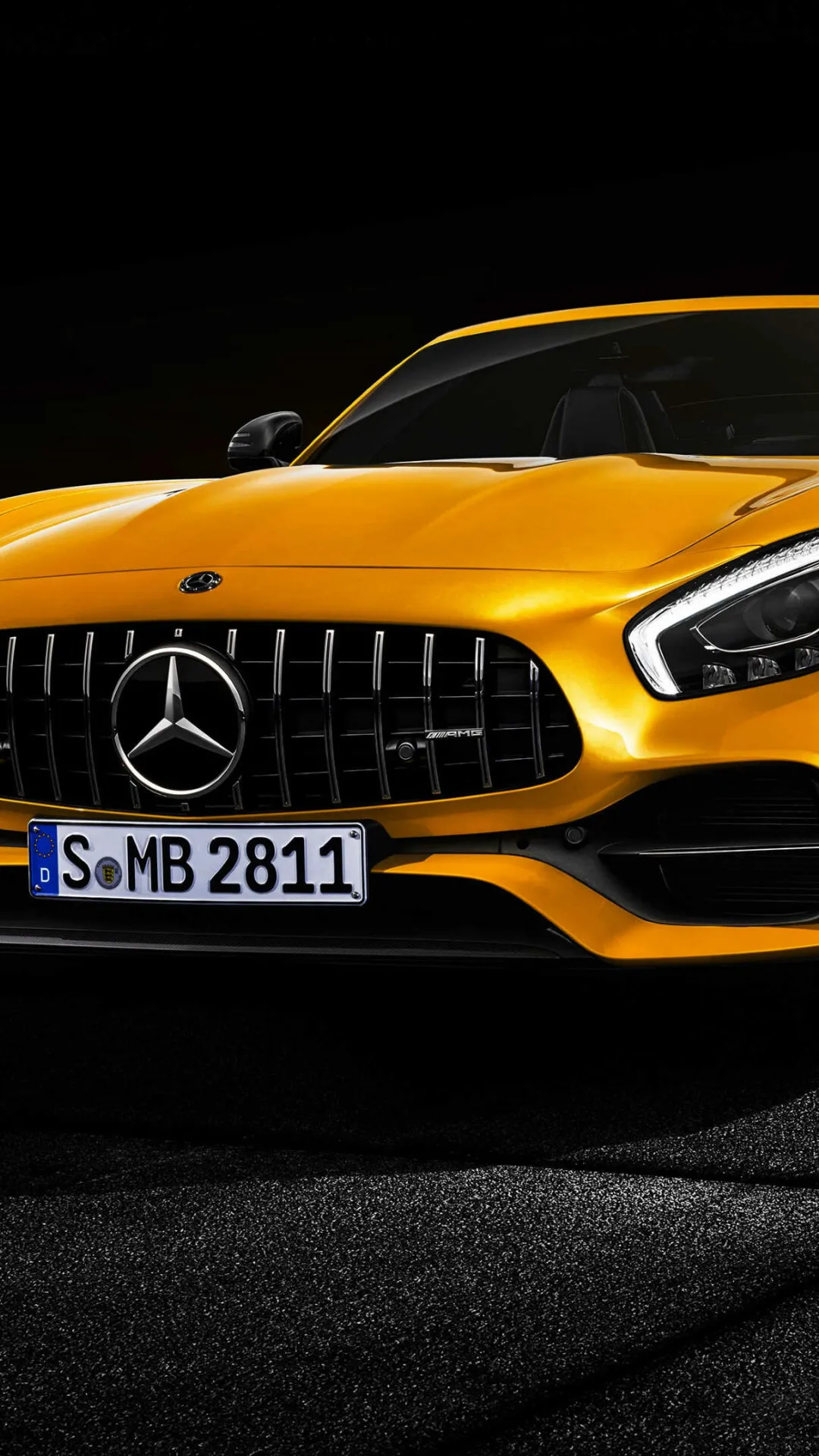 Bright Yellow Mercedes AMG in Dark Studio Wallpaper