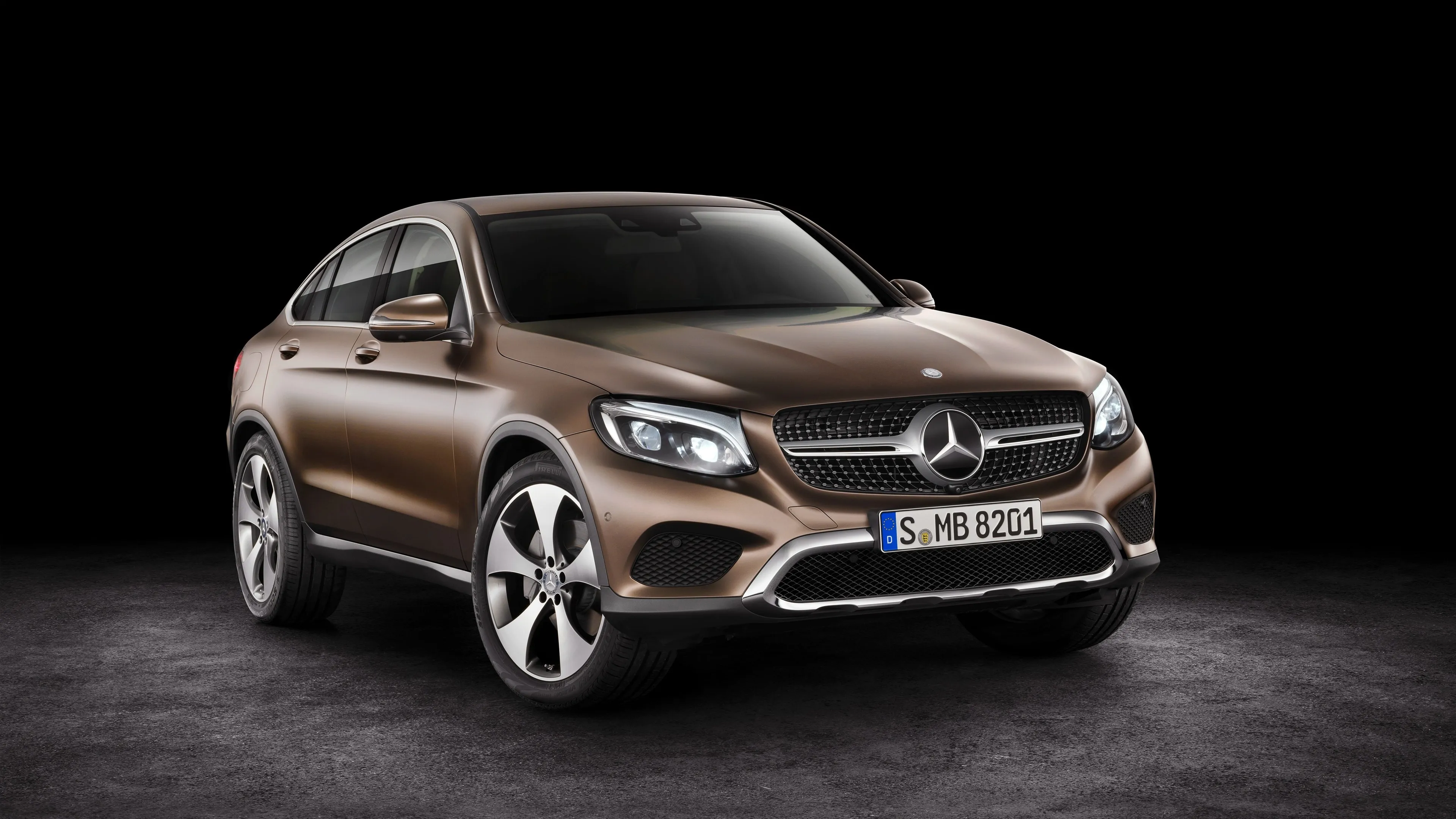 Bronze Mercedes Coupe Captured in Studio Dark Setting