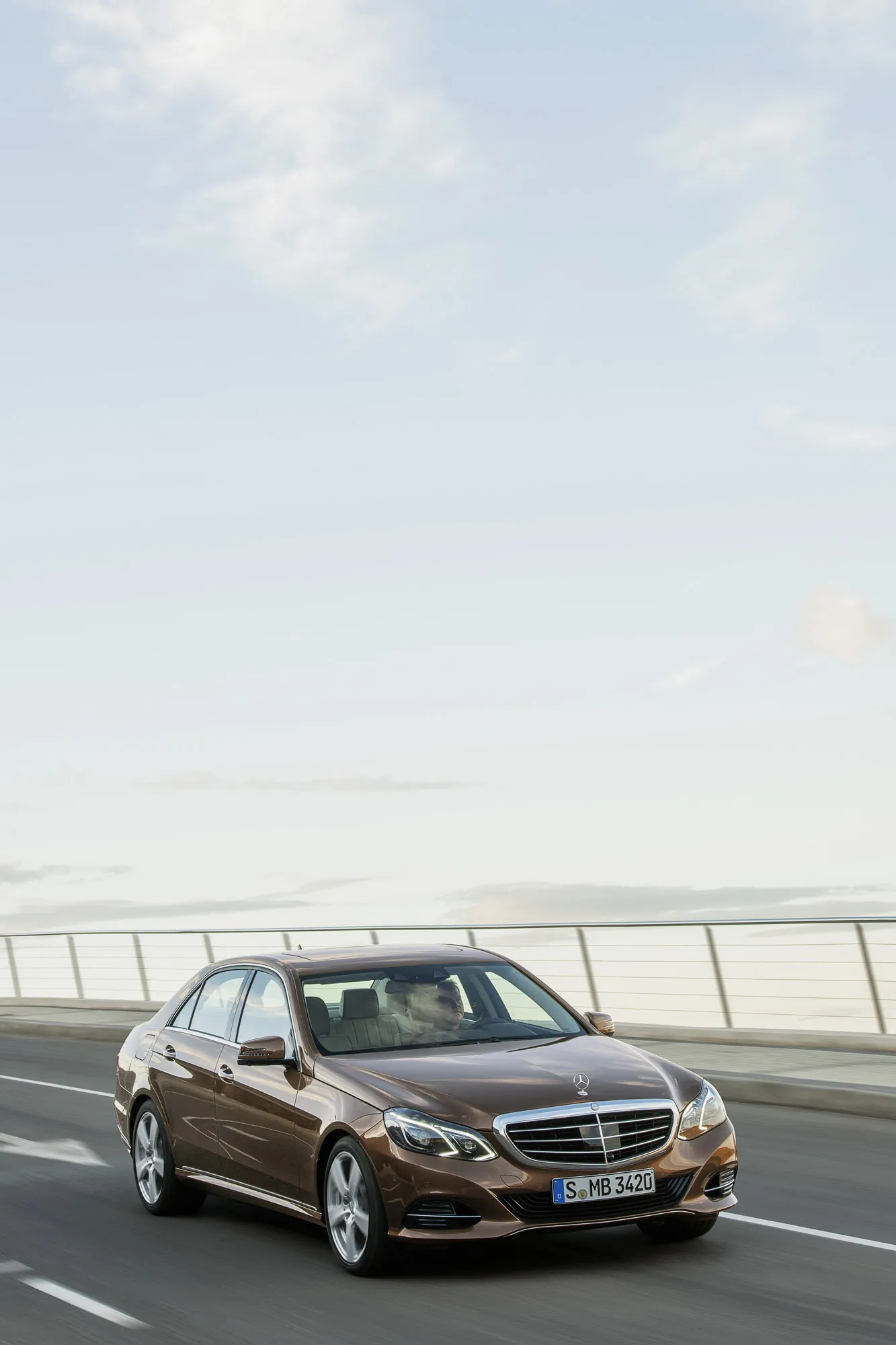 Brown Mercedes Benz Sedan Parked on Seaside Road Wallpaper